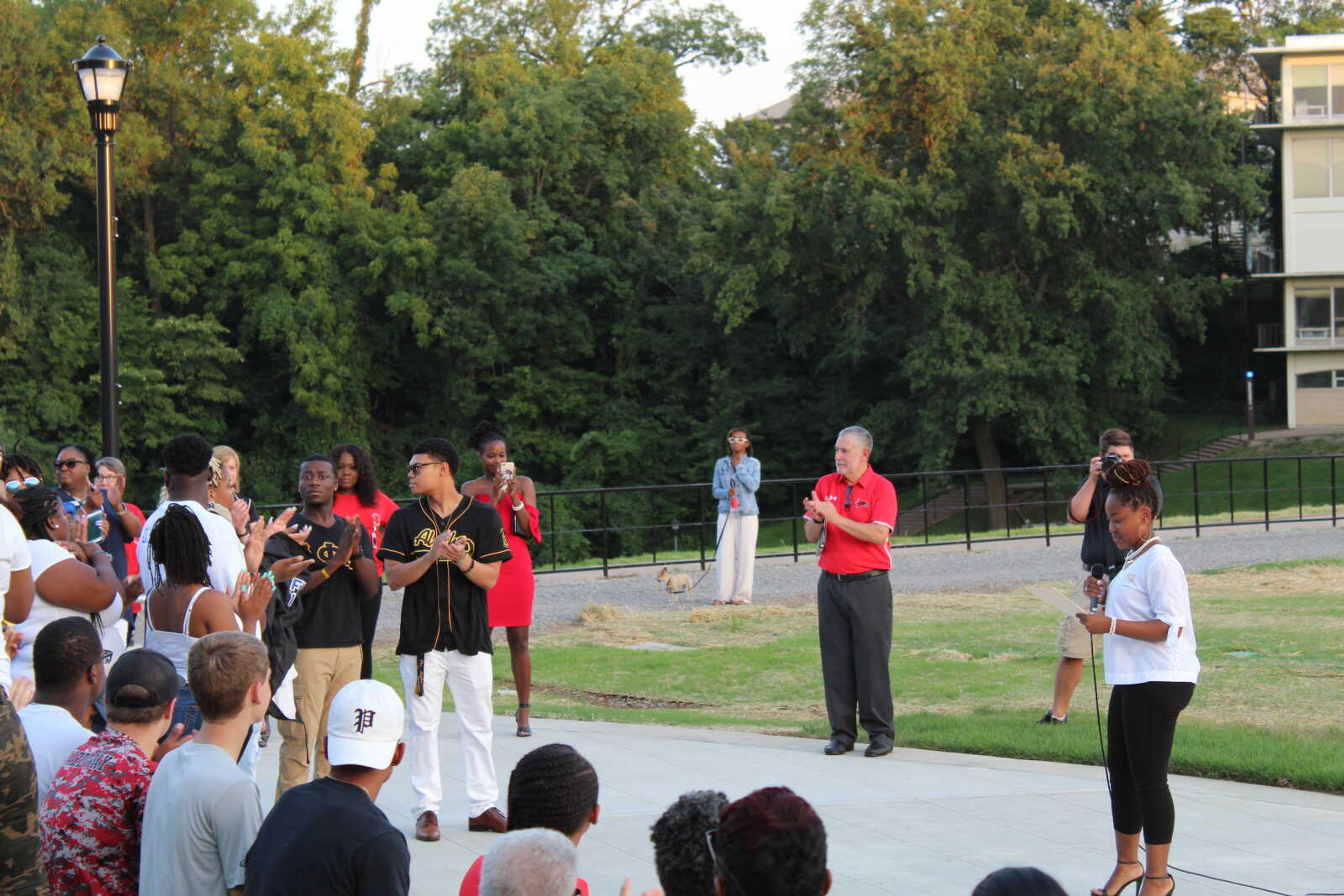 University president Carlos Vargas, Jaleea Hudson-Wilson and those in attendance applaud the opening of Southeast's new NPHC Plaza at the opening ceremony Aug. 16.
