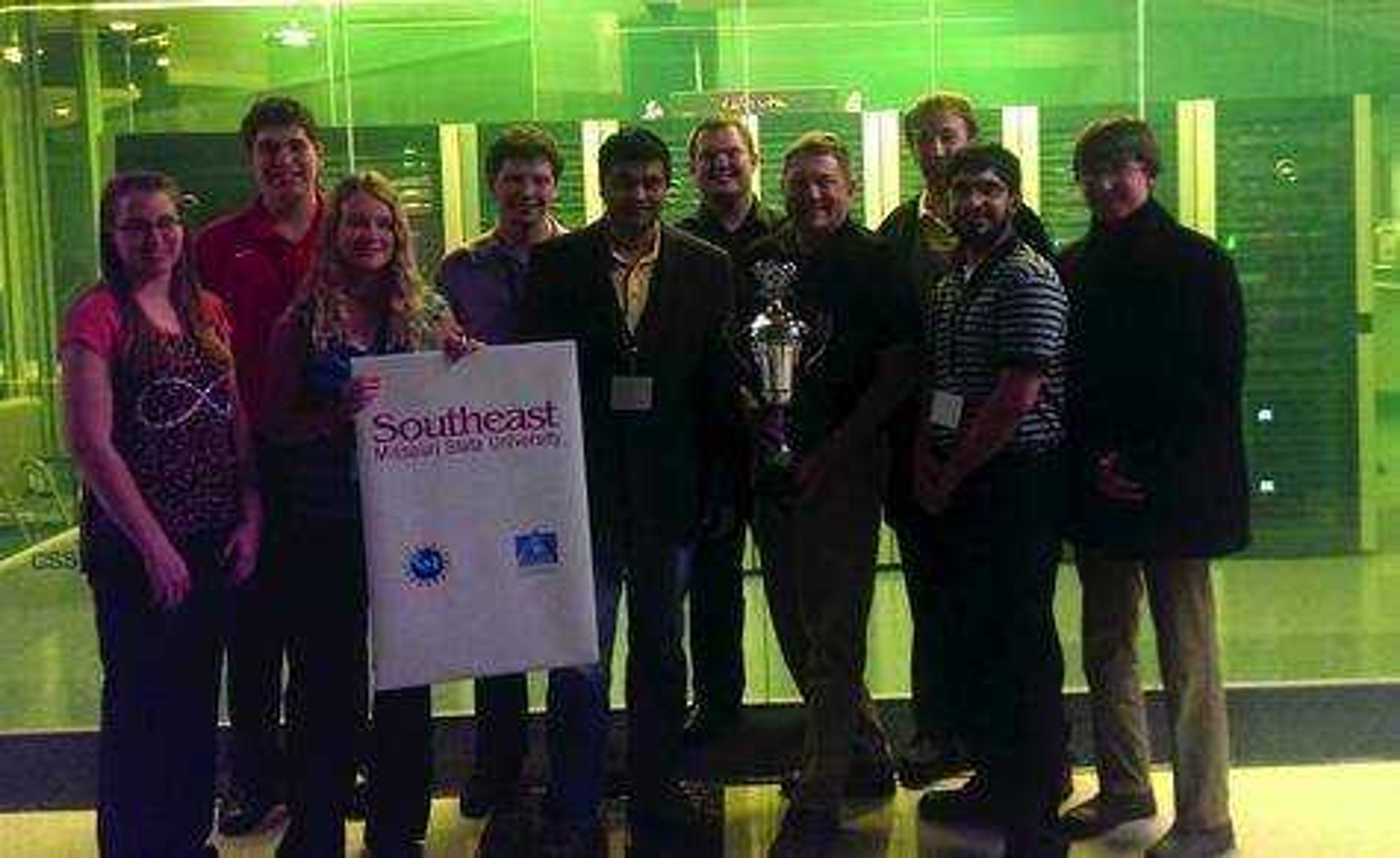 The Southeast cybersecurity team poses with the trophy it won at last year's regional competition. The team will head to regionals on March 27-28. submitted photo