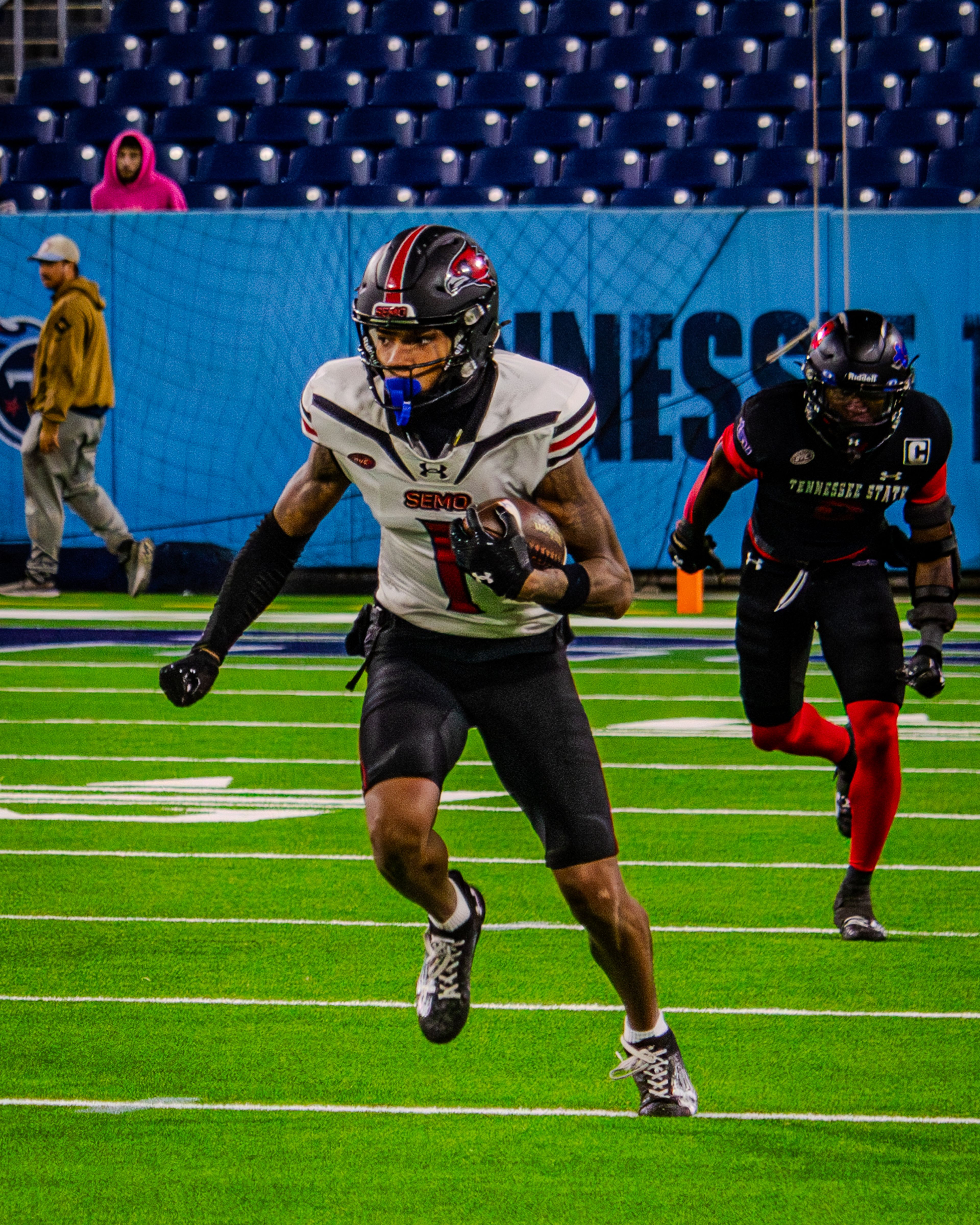 Junior wide receiver Tristan Smith runs with the ball during the game against TSU.