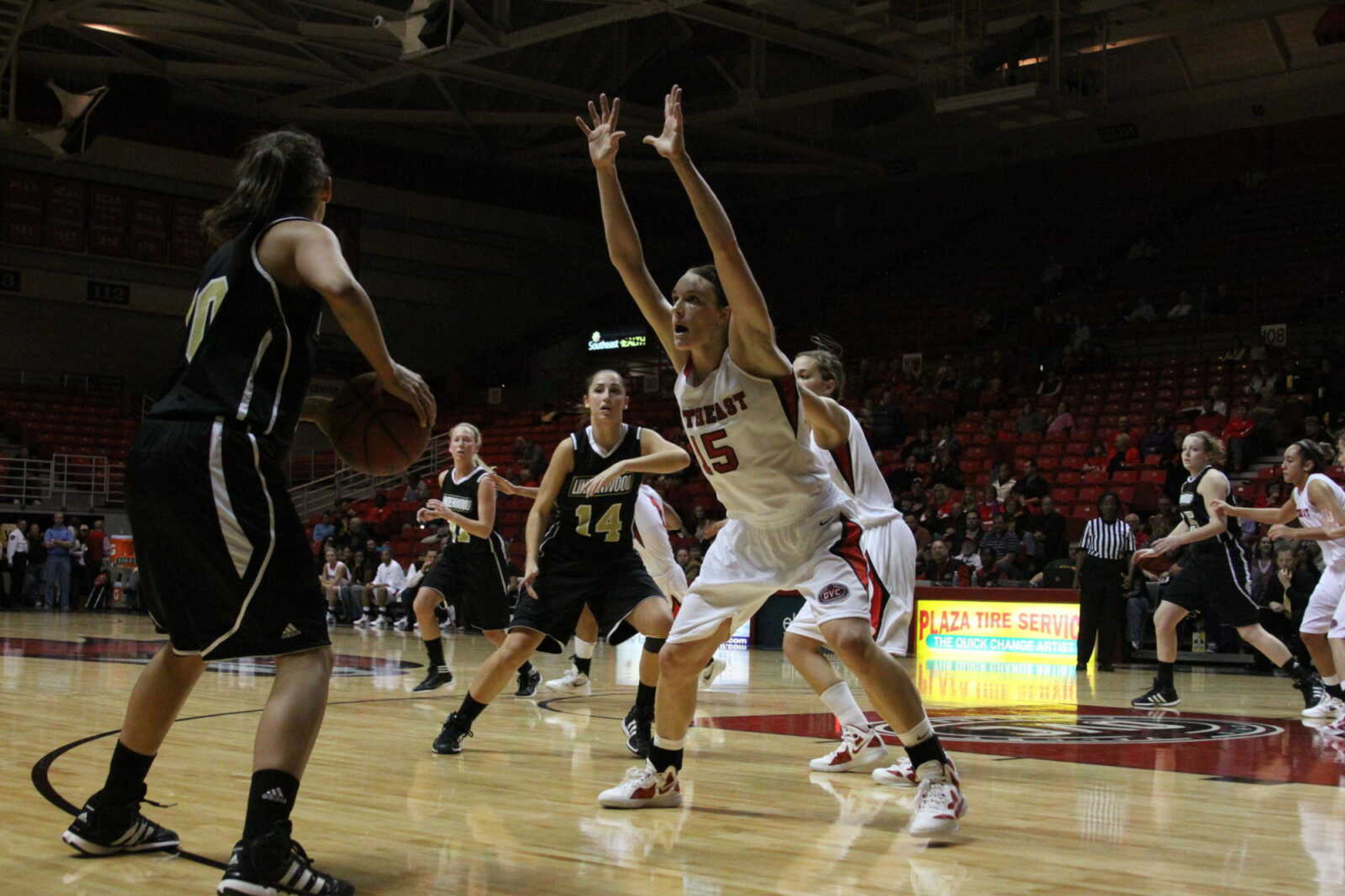 Junior forward Courtney Shiffer defends a Lindenwood player during Saturday's game. Southeast won the game 66-56. Shiffer recorded her first career double-double with 13 points and a career-high 17 rebounds. - Photo by Kelso Hope