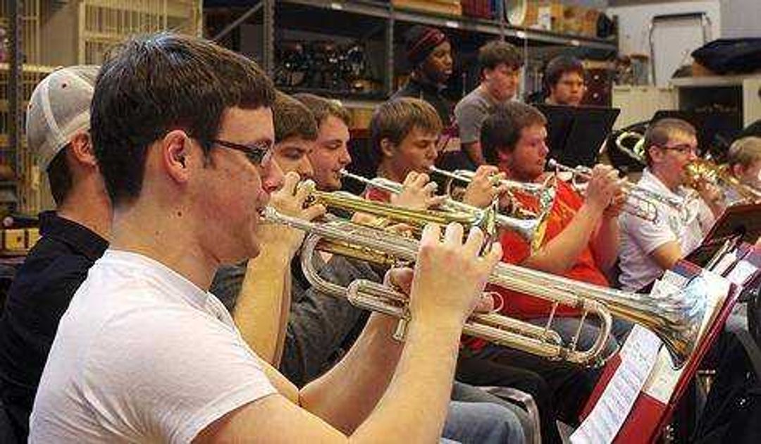 Members of the Southeast Wind Symphony rehearse for the concert "Hot and Saxy." Photo by Nathan Hamilton
