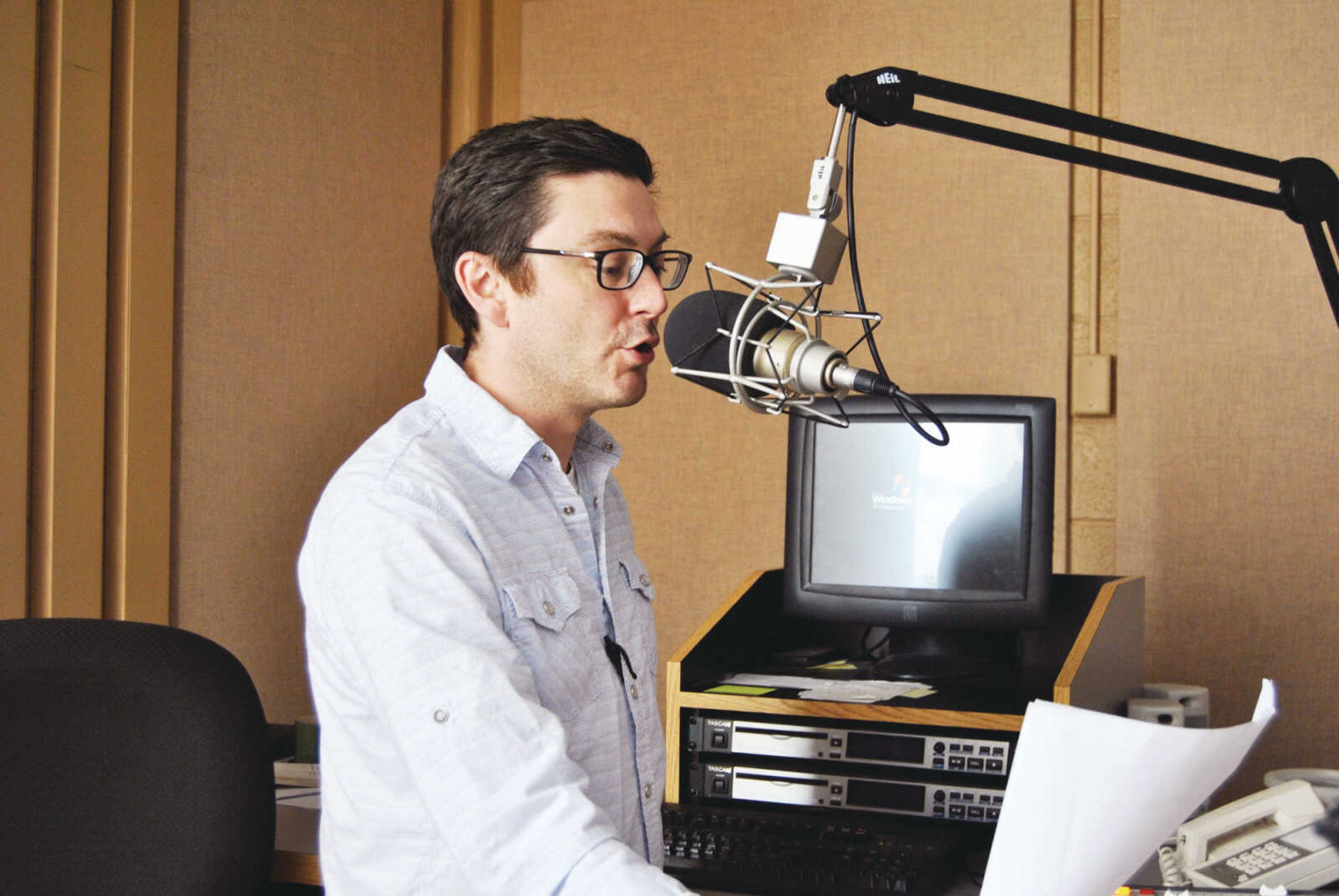 <b>Host and news producer Jacob McCleland during a show at KRCU. </b> Photo by J.C. Reeves
