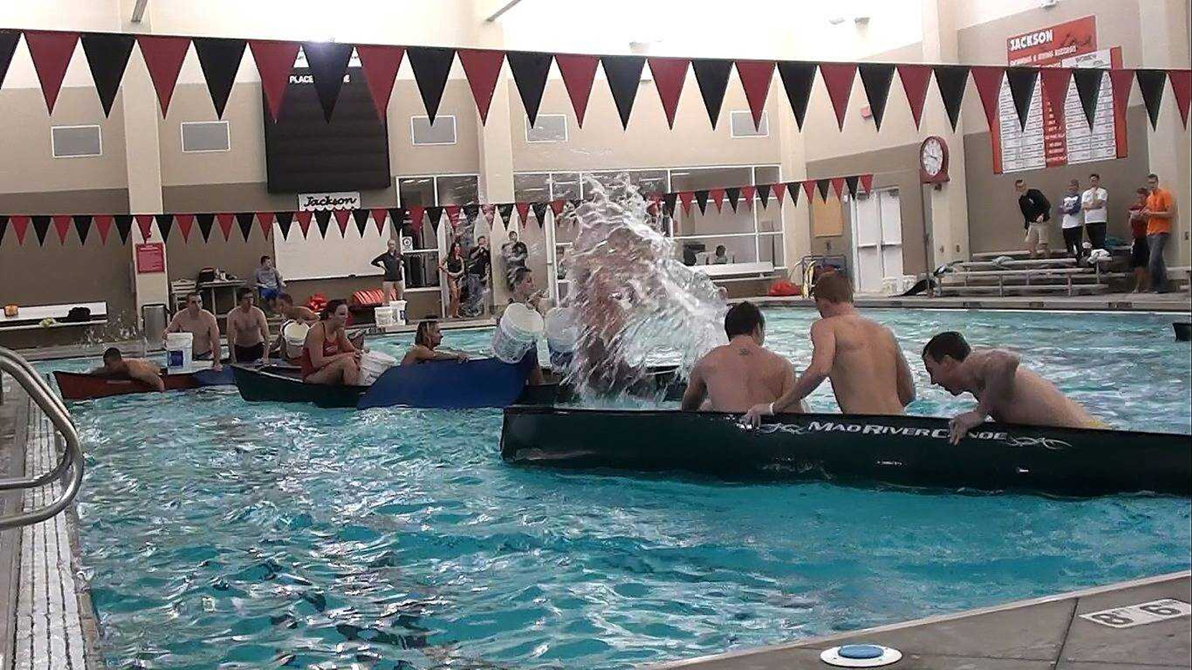 <b>Contestants try to sink canoes during the battleship event <br>
on Oct. 8, 2012.</b> Photo by Kyle Theis