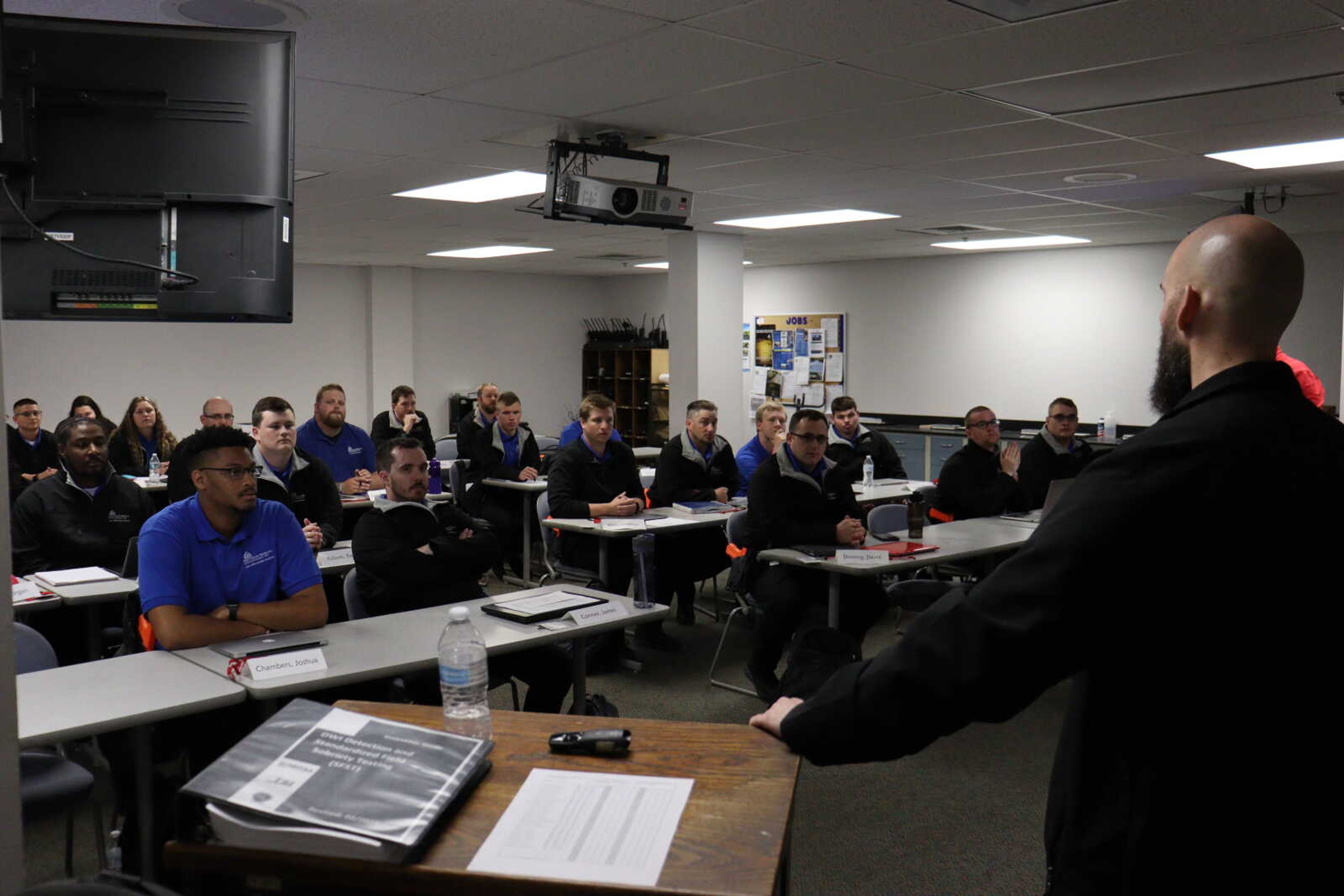 Students gather in the classroom of the Law Enforcement Academy to prepare for the training of that day. It is in rooms like these where the next generation of law enforcement and criminal justice professionals are born.