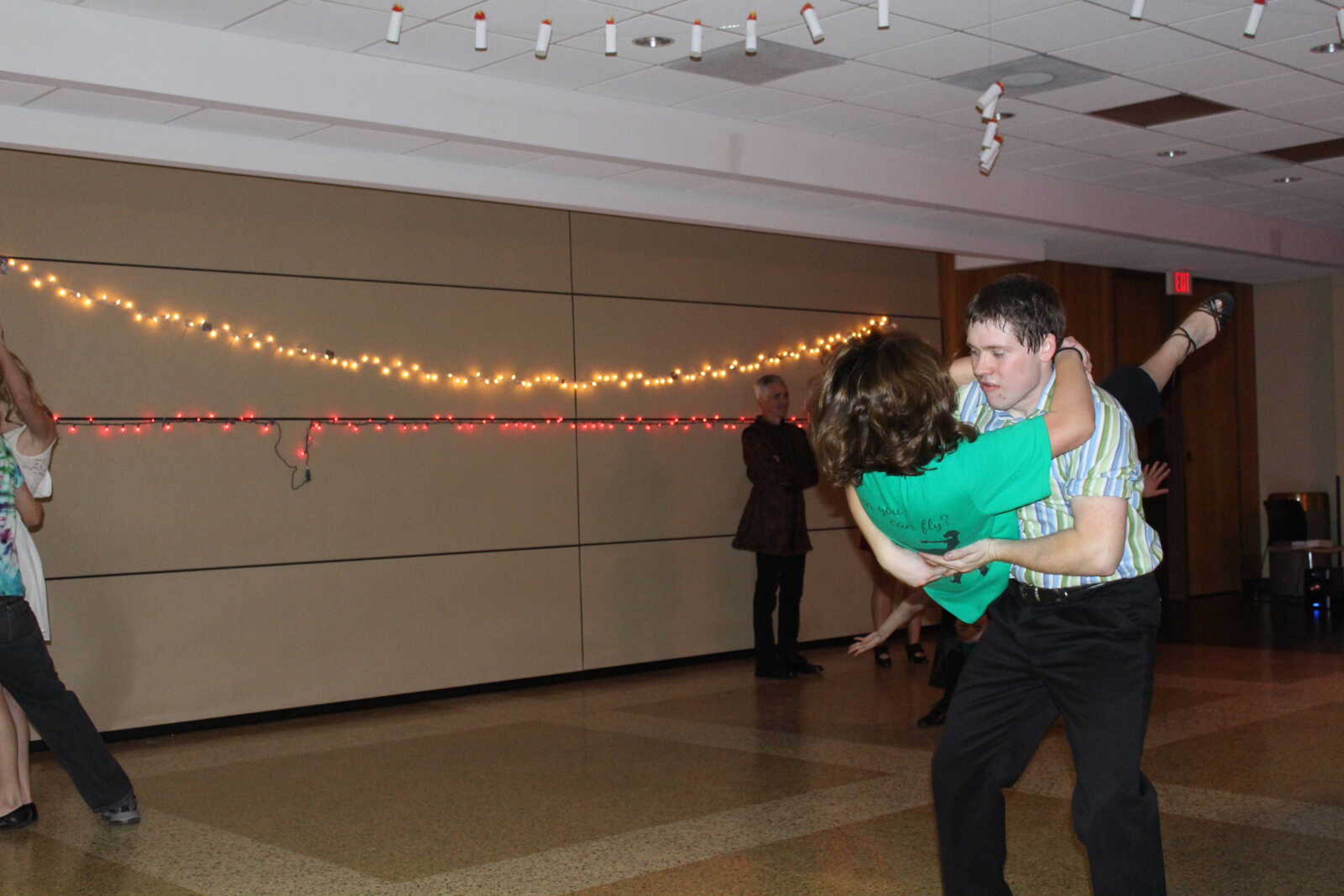 Members of the Ariel Swing Dance club show off their moves at the Yule Ball on Saturday.