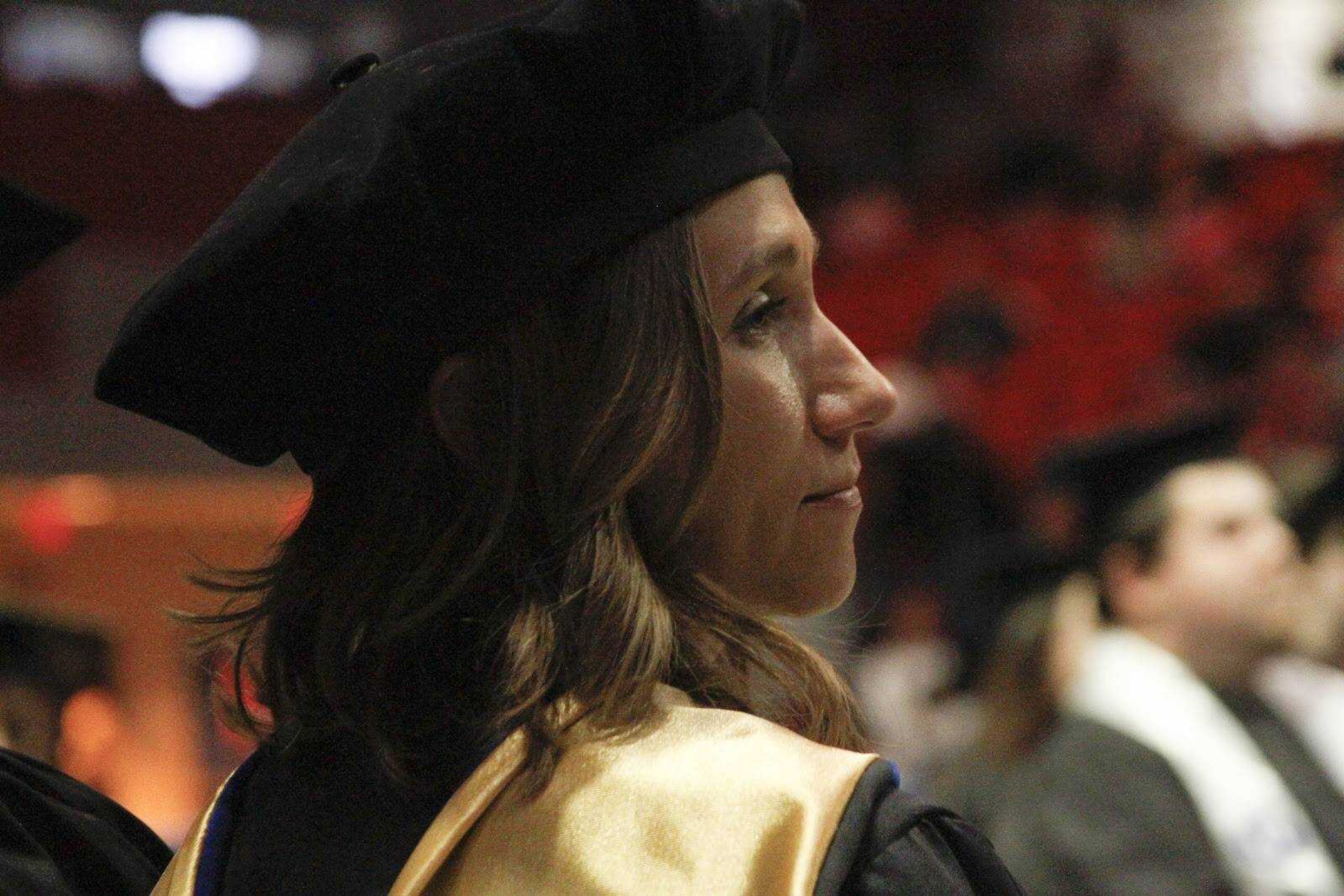 A faculty member looks toward the stage at Southeast Missouri State University's winter commencement ceremony on Saturday, Dec. 14, 2019, at the Show Me Center in Cape Girardeau.
