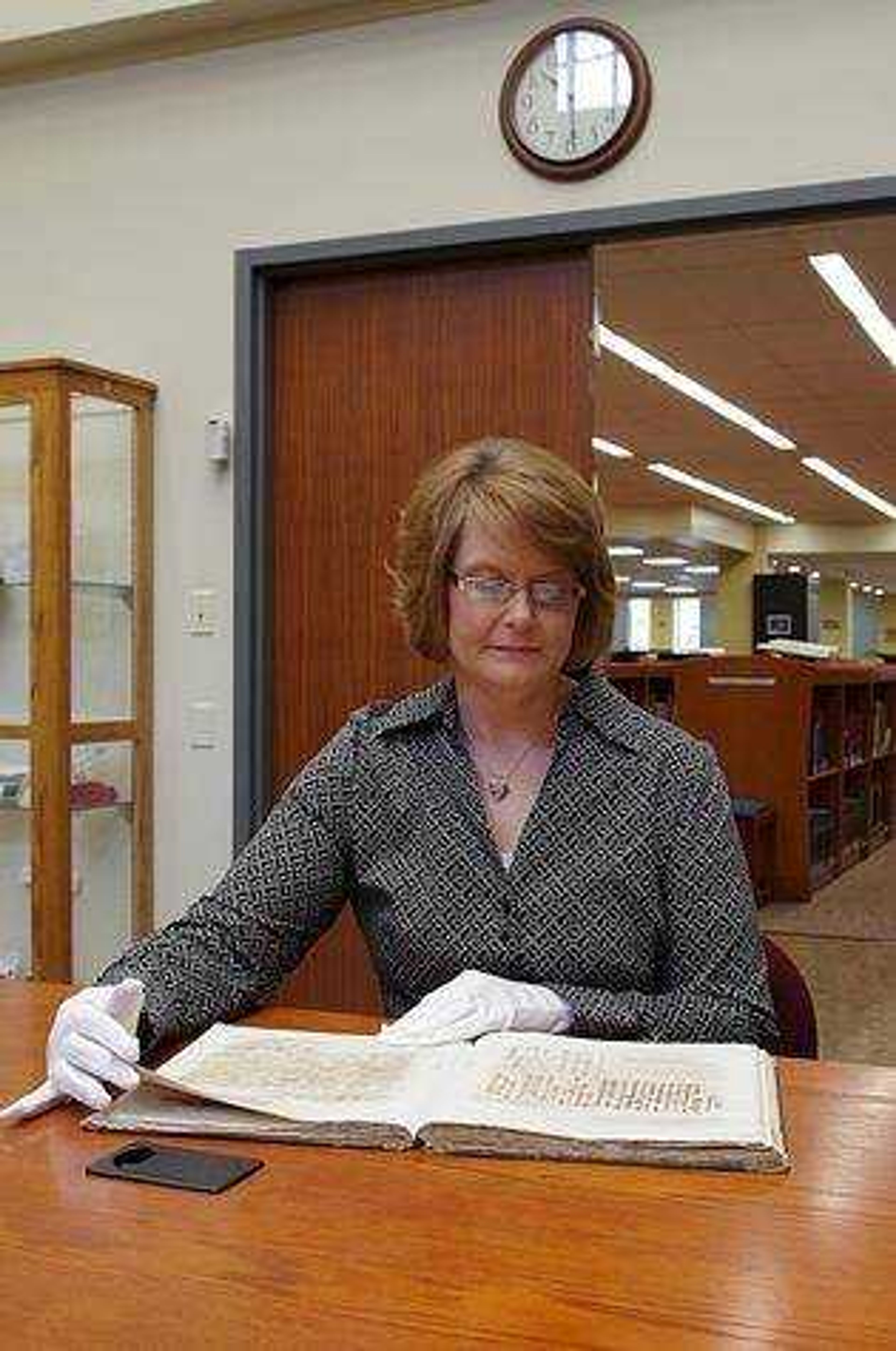 Dr. Lisa Speers browses through a book from the Civil War Collection. Photo by Nathan Hamilton