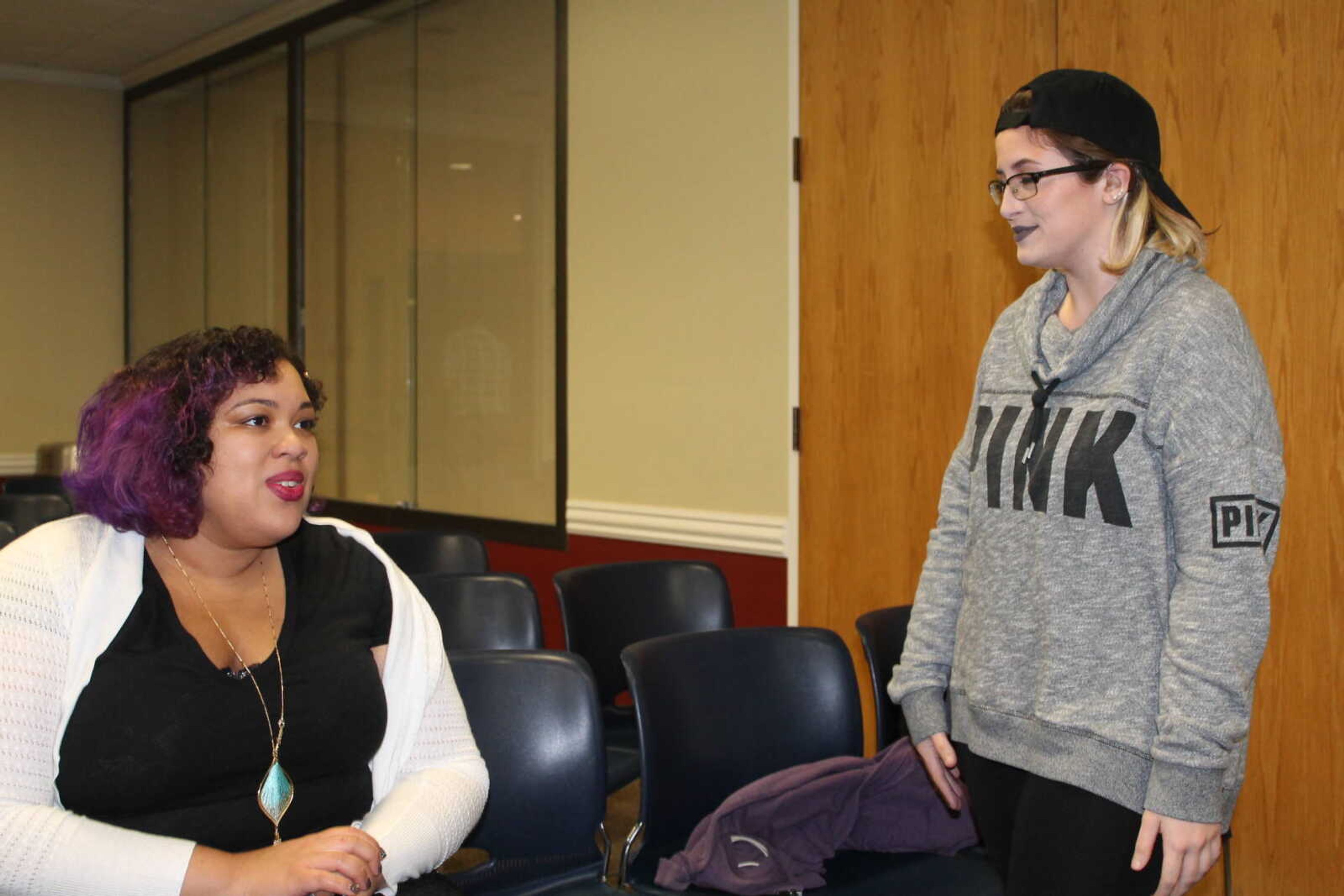 Danielle Evans speaking with student, Mary Jo Blunk, after the reading.