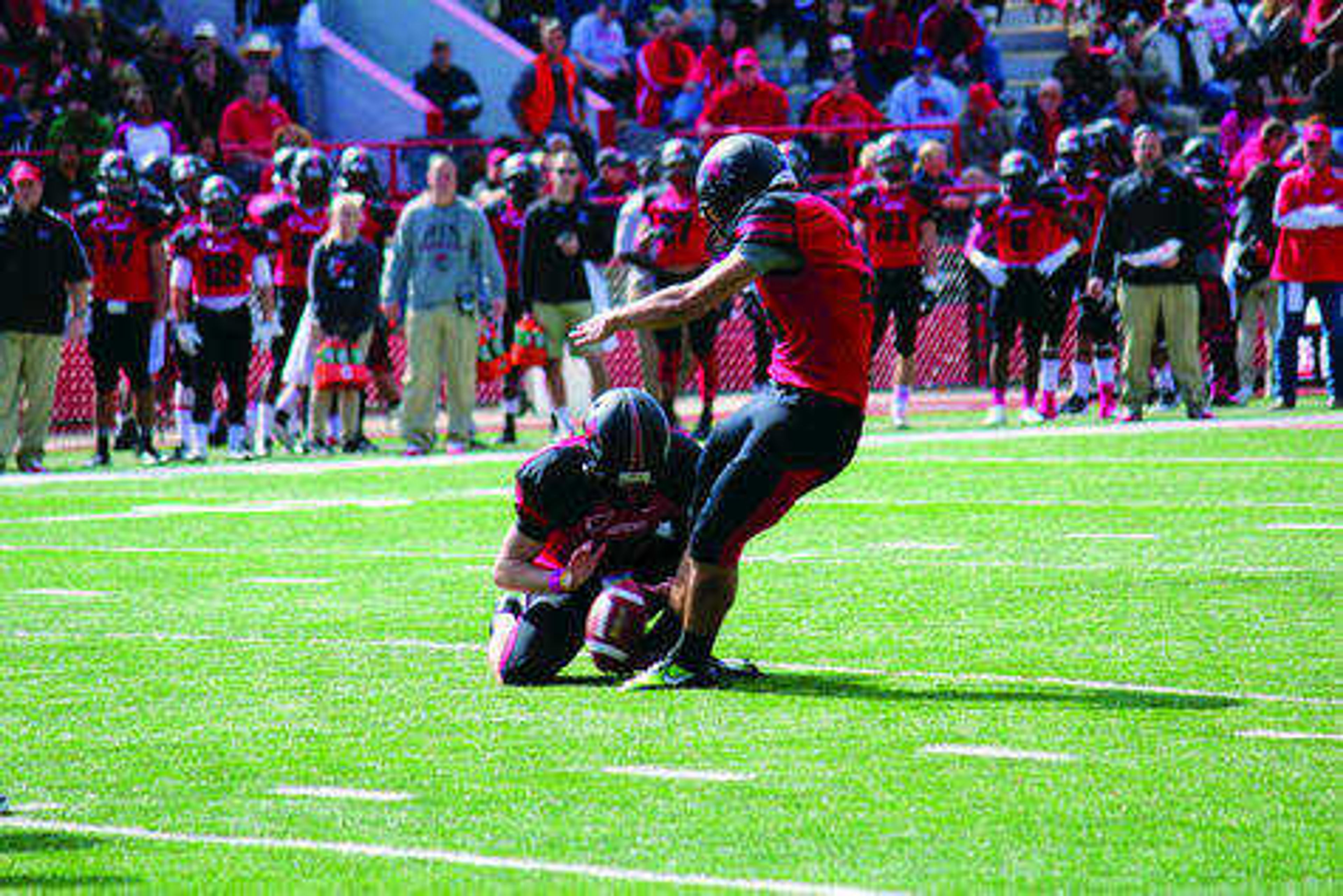 Ryan McCrum attempting a field goal against Eastern Illinois on Oct. 18 at Houck Stadium. Photo by J.C. Reeves