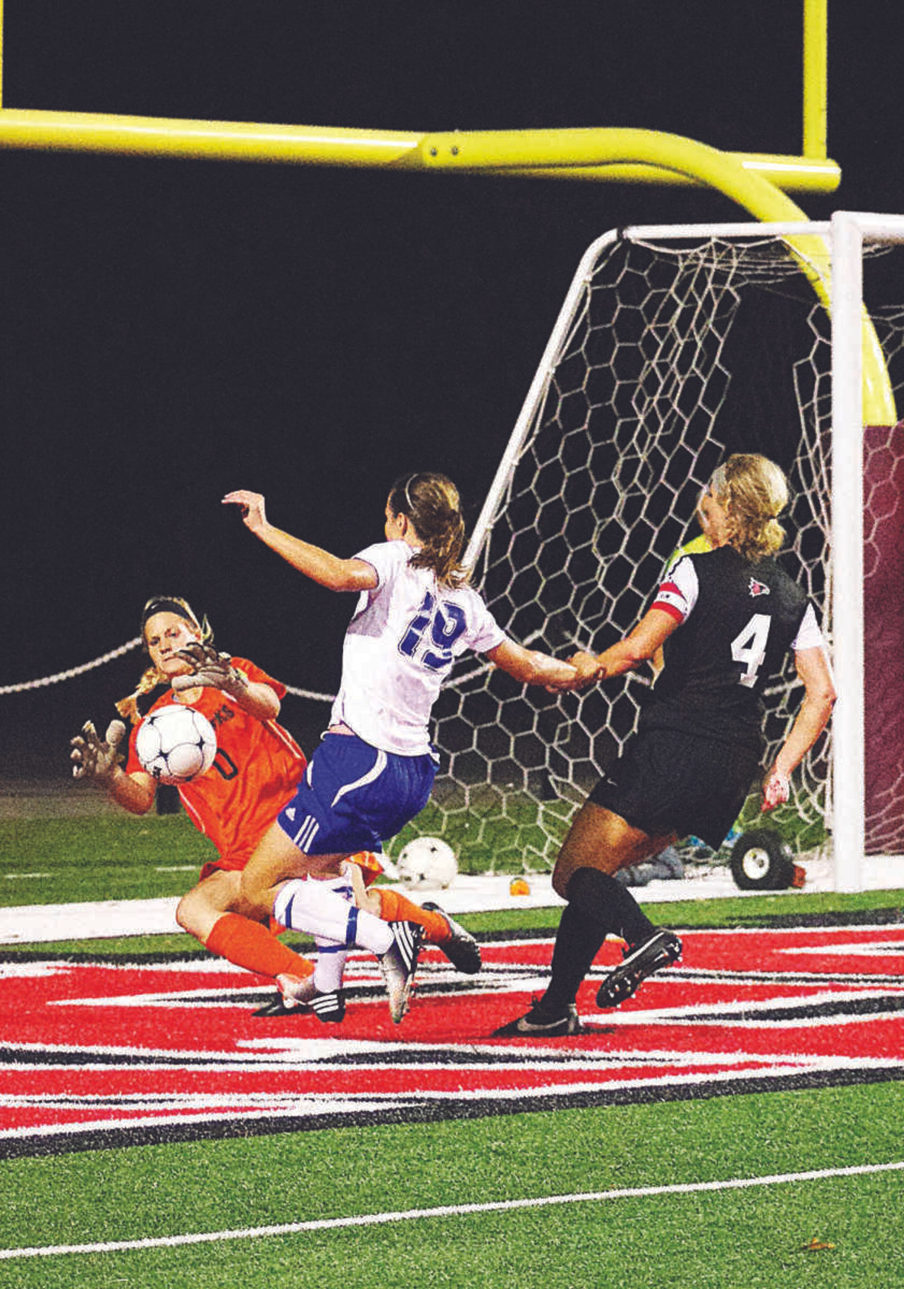 <b>Renee Kertz makes a save for Southeast during a game last fall.</b> Photo by Nathan Hamilton