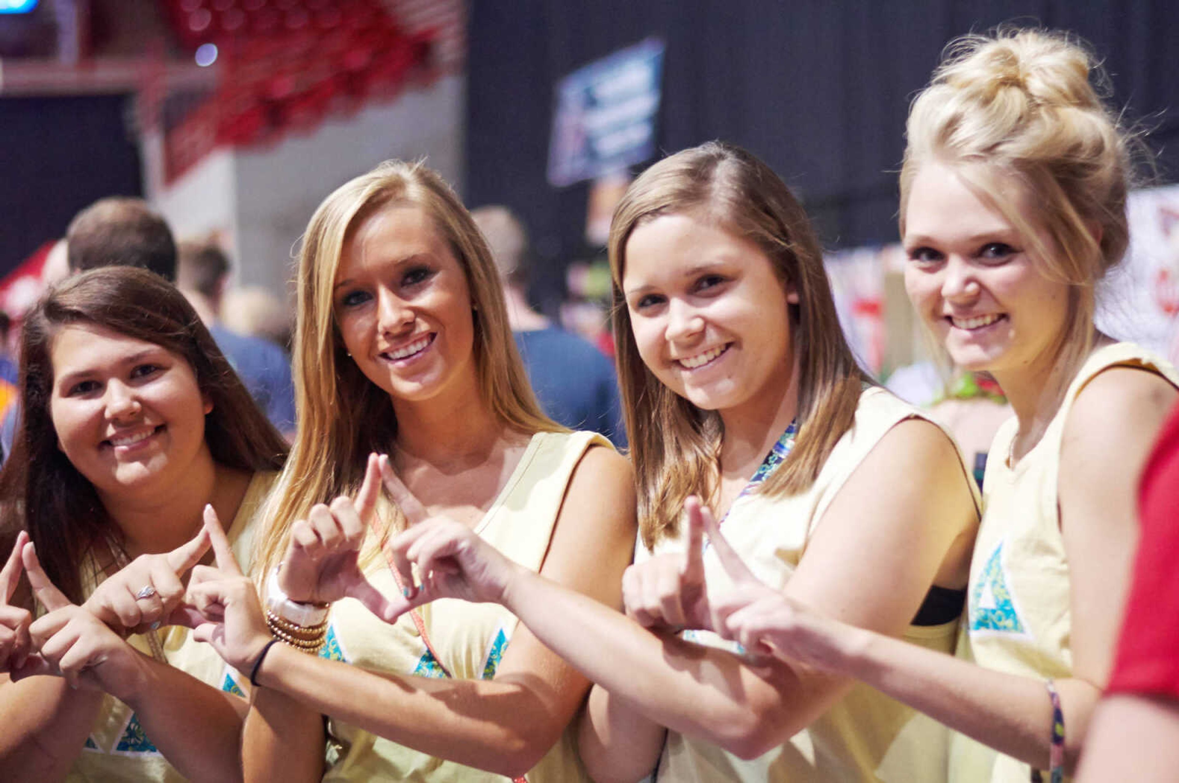 Delta Delta Delta sorority members pose for the picture. Photo by Alyssa Brewer