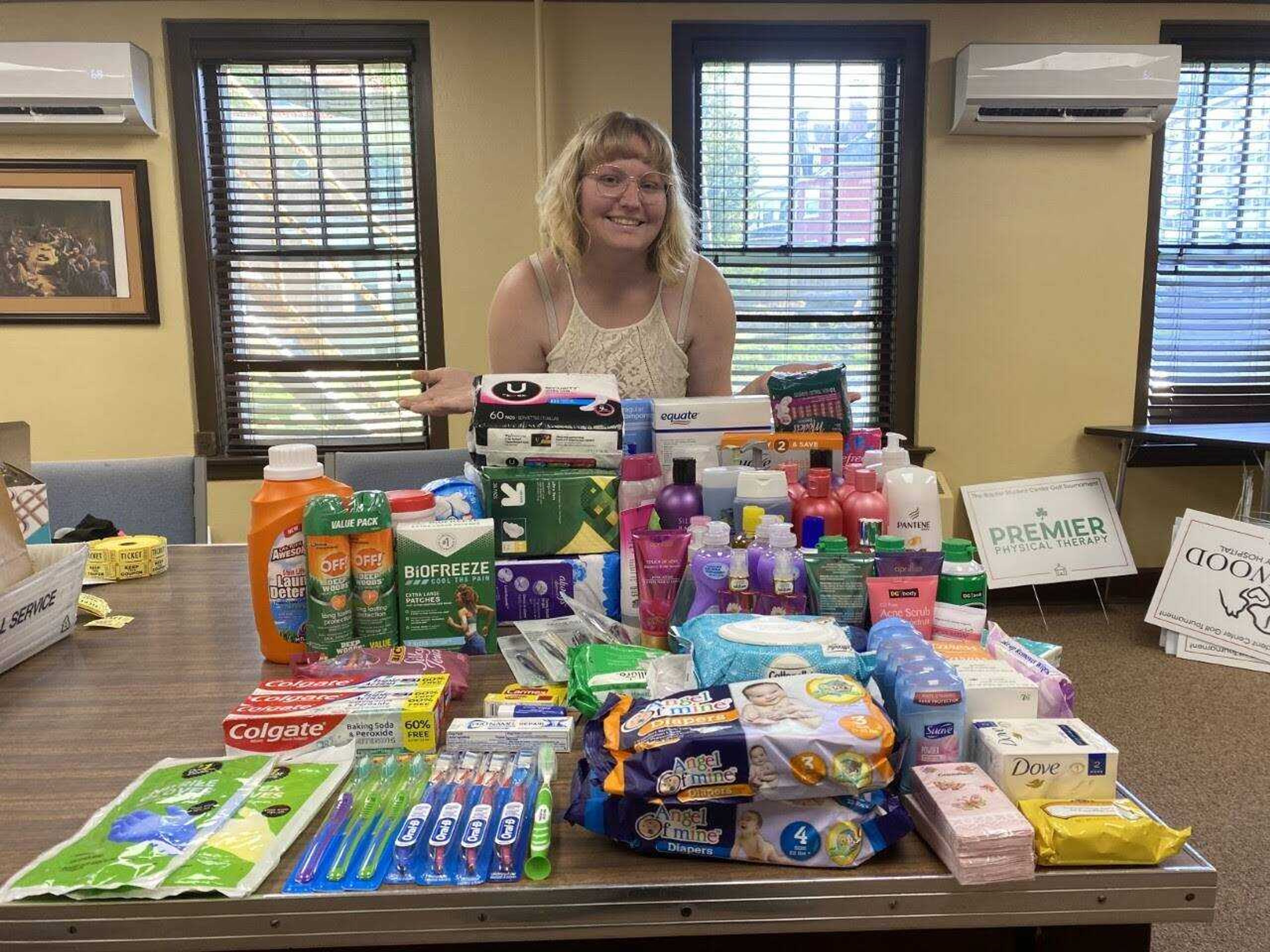 Southeast student Breah Rennie, member of Planned Parenthood Action SEMO, poses with hygiene products the group collected to donate to Safe House for Women in Cape Girardeau on May 6. The group collected 650 pads and tampons, 37 bottles of shampoo, conditioner and lotion, and more across Southeast’s campus during the month of April.