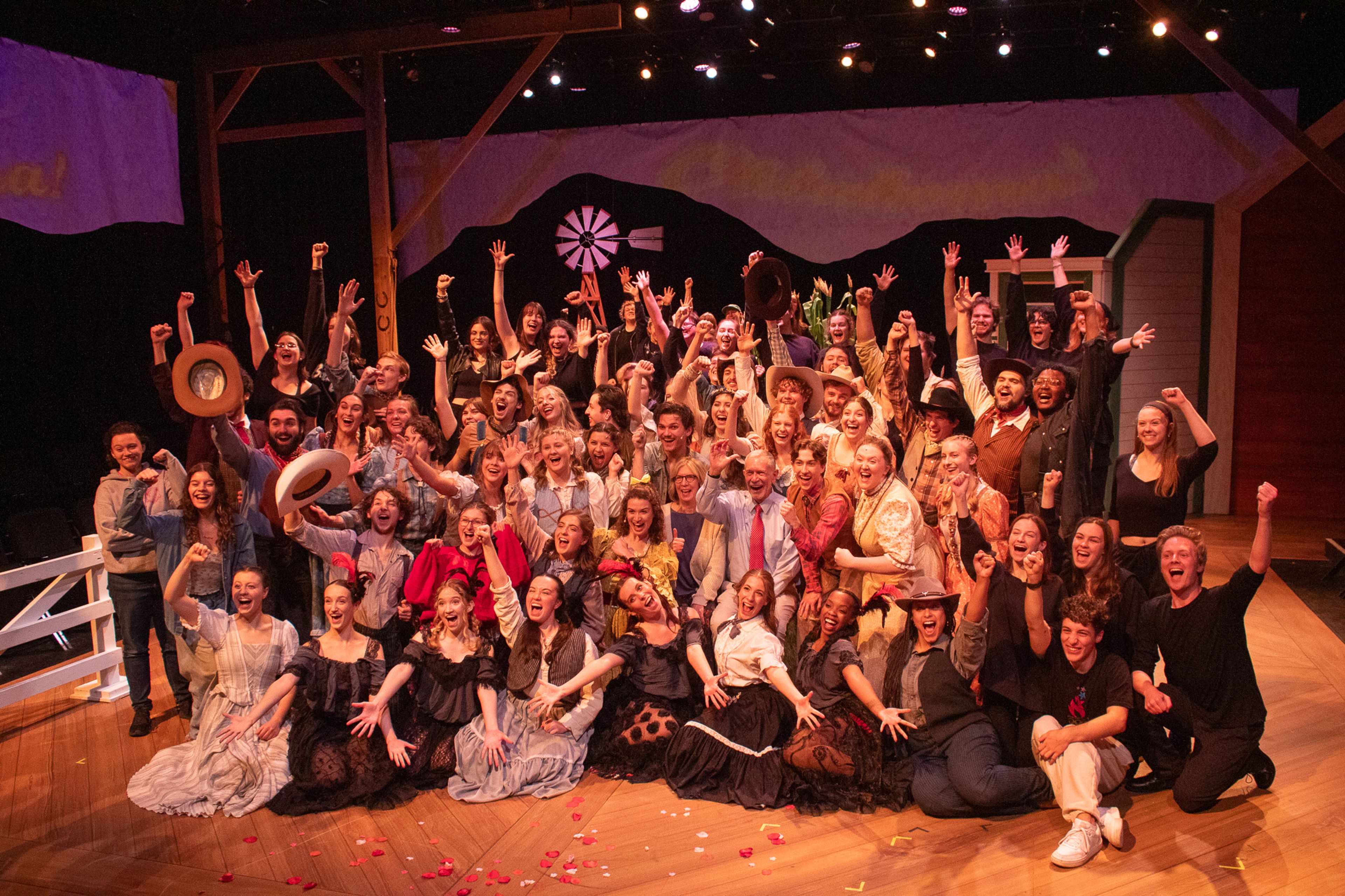 SEMO President Carlos Vargas and his wife Pam Vargas pose with the cast and crew of Oklahoma and give a big "yee haw." 