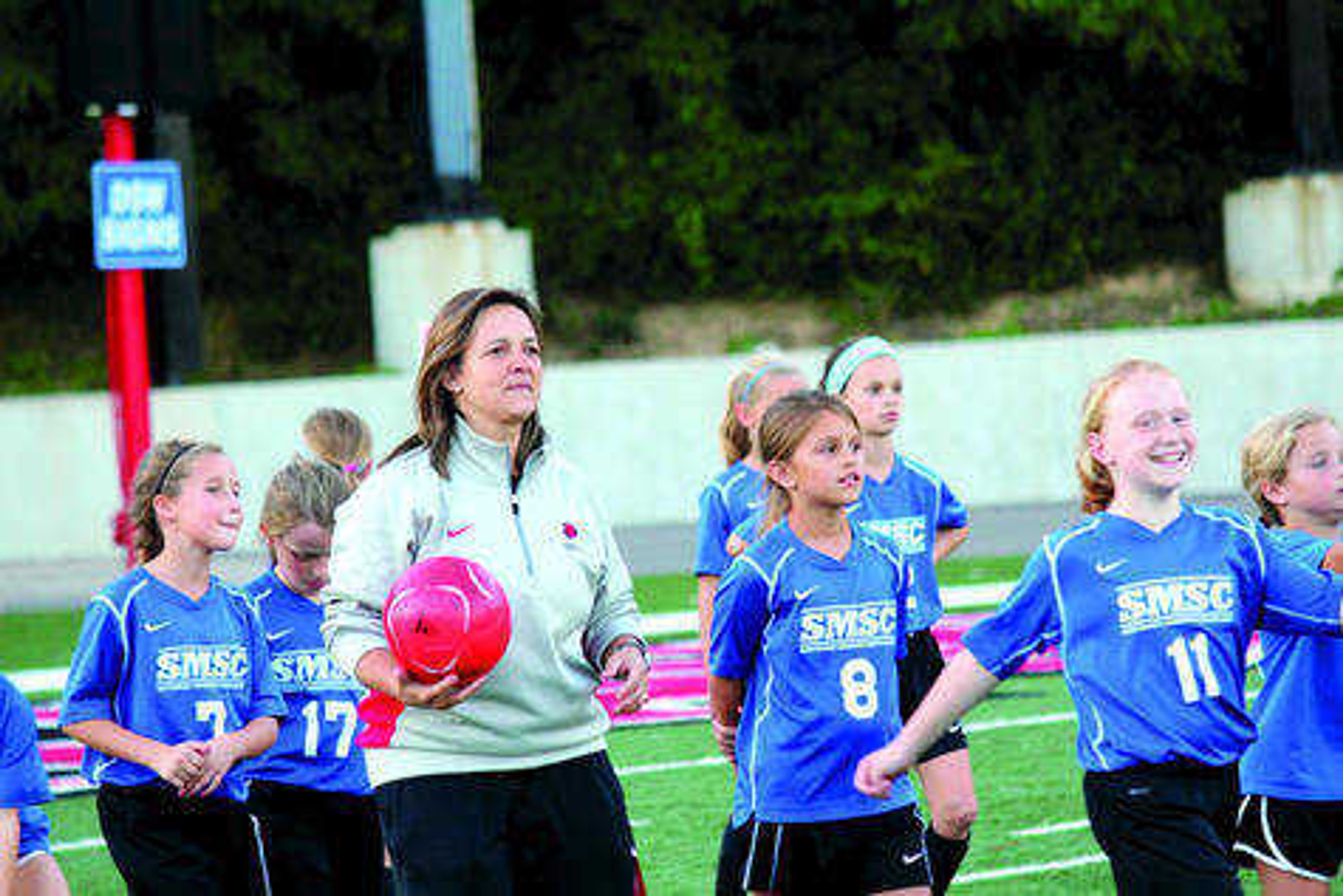 Heather Nelson and members of the Missouri Youth Club Soccer team at Houck Stadium during practice. Photos by Isaiah Adams