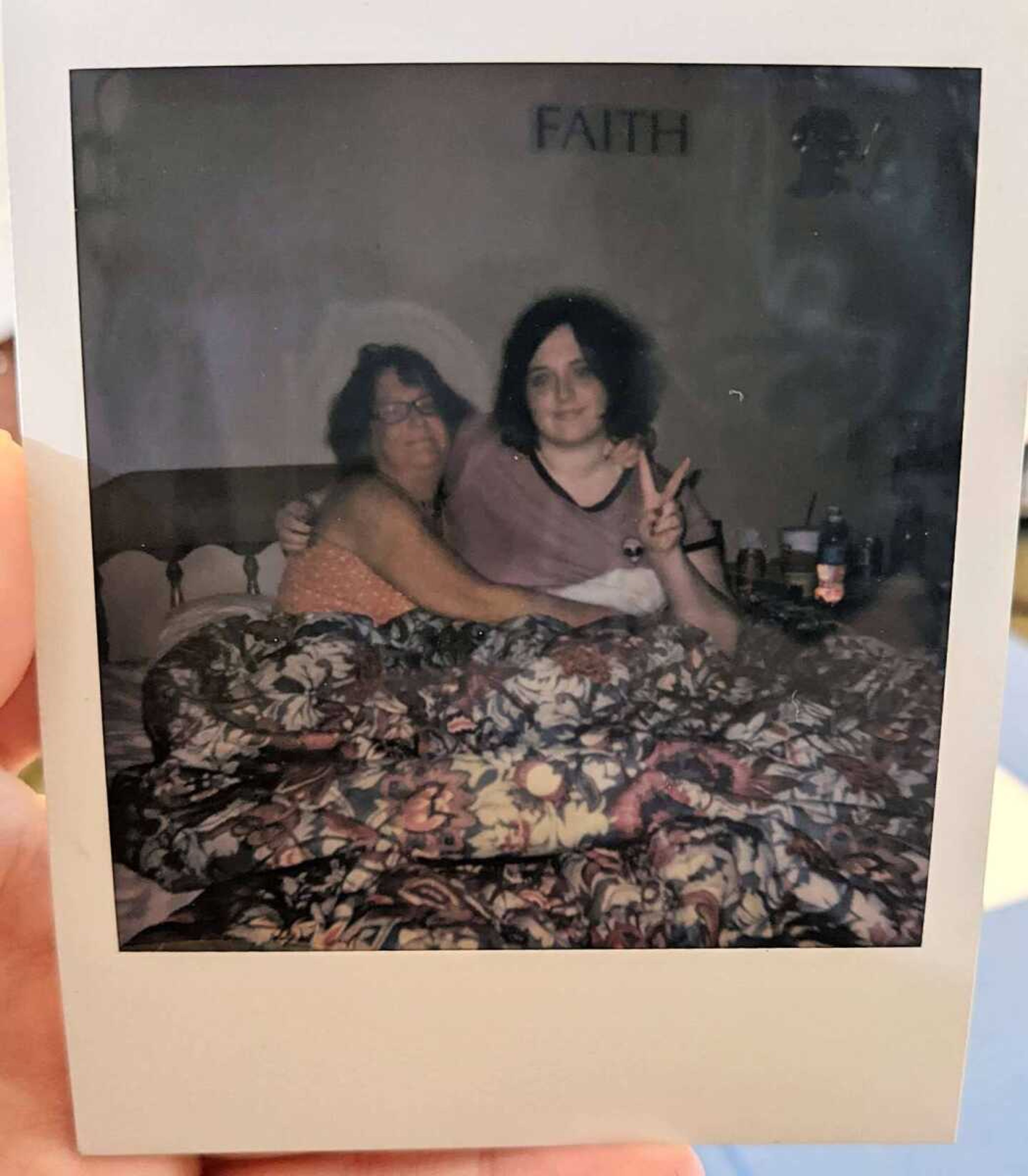 A Polaroid photo captures a moment between Emily Hayden, 17, and her mother at the Woodland Inn in Marble Hill.