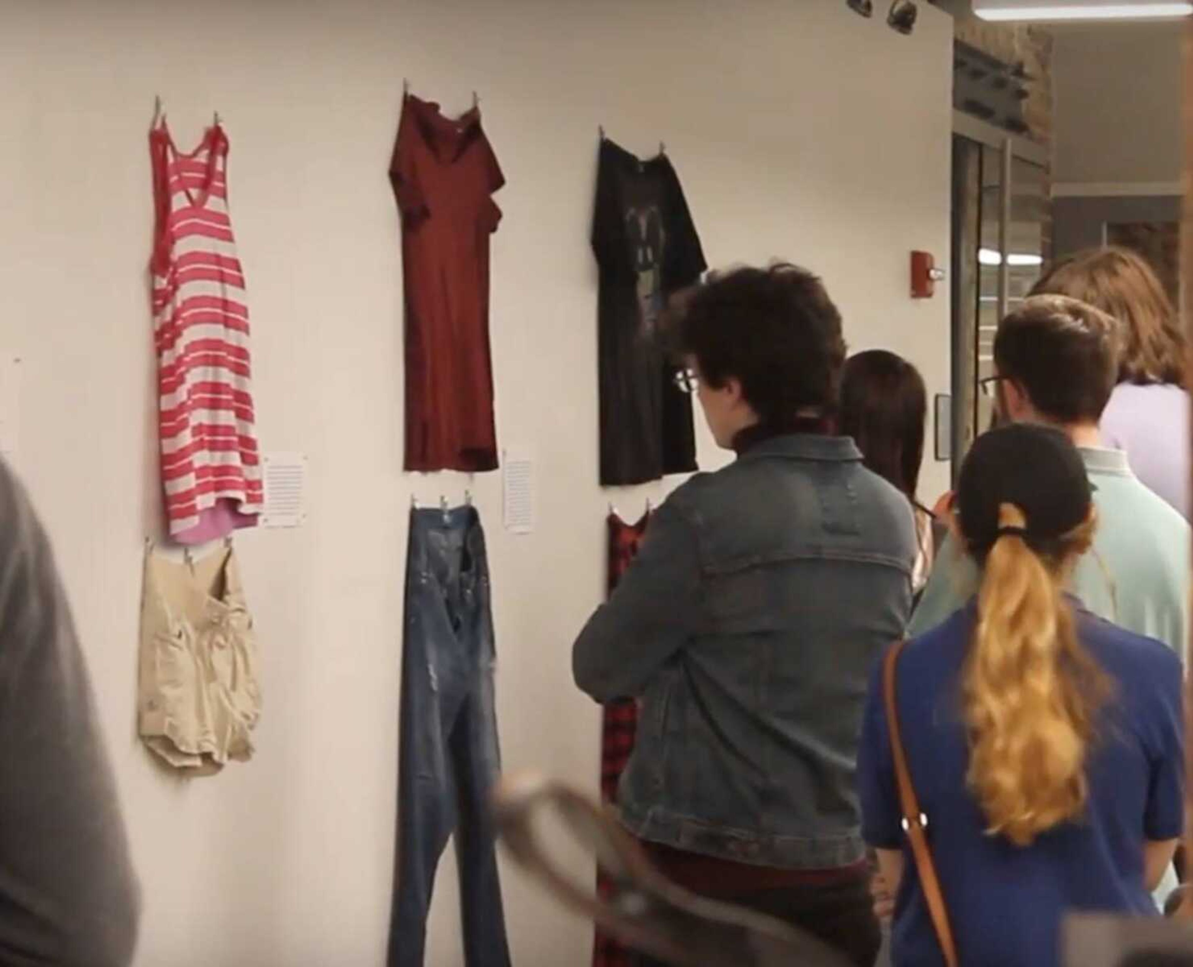 Community members stopped by Catapult April 5 to see the "What Were You Wearing?" exhibit, where sexual assault survivors hung clothes similar to the ones they were wearing at the time of their assault on the way.