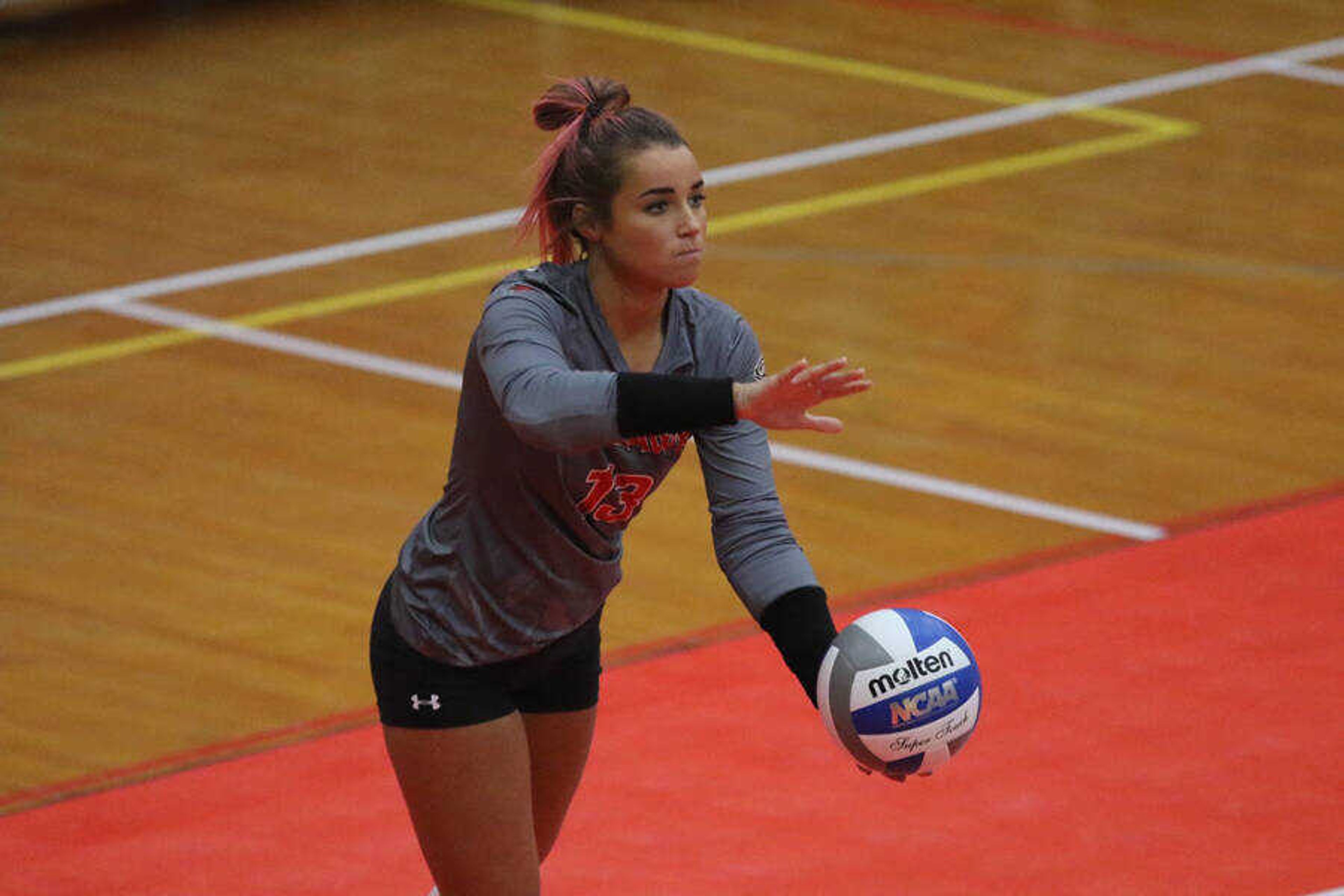 Emily Boggetto prepares to serve at a home match in the midst of the 23-11 campaign in 2019.