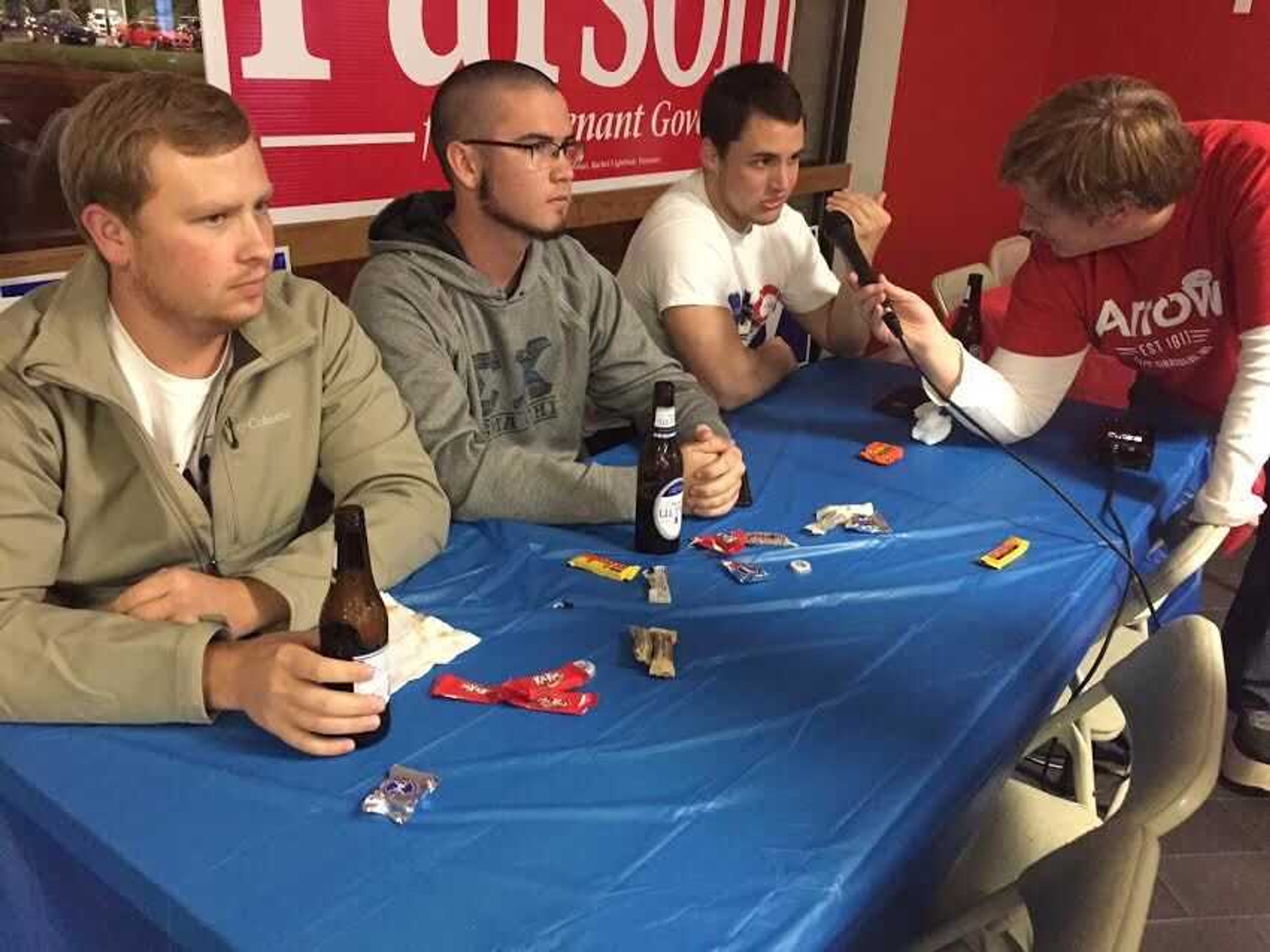 Austin Tanck, Ben Rischbieter and Zac Johnson sit at the Cape County Republican watch party.
