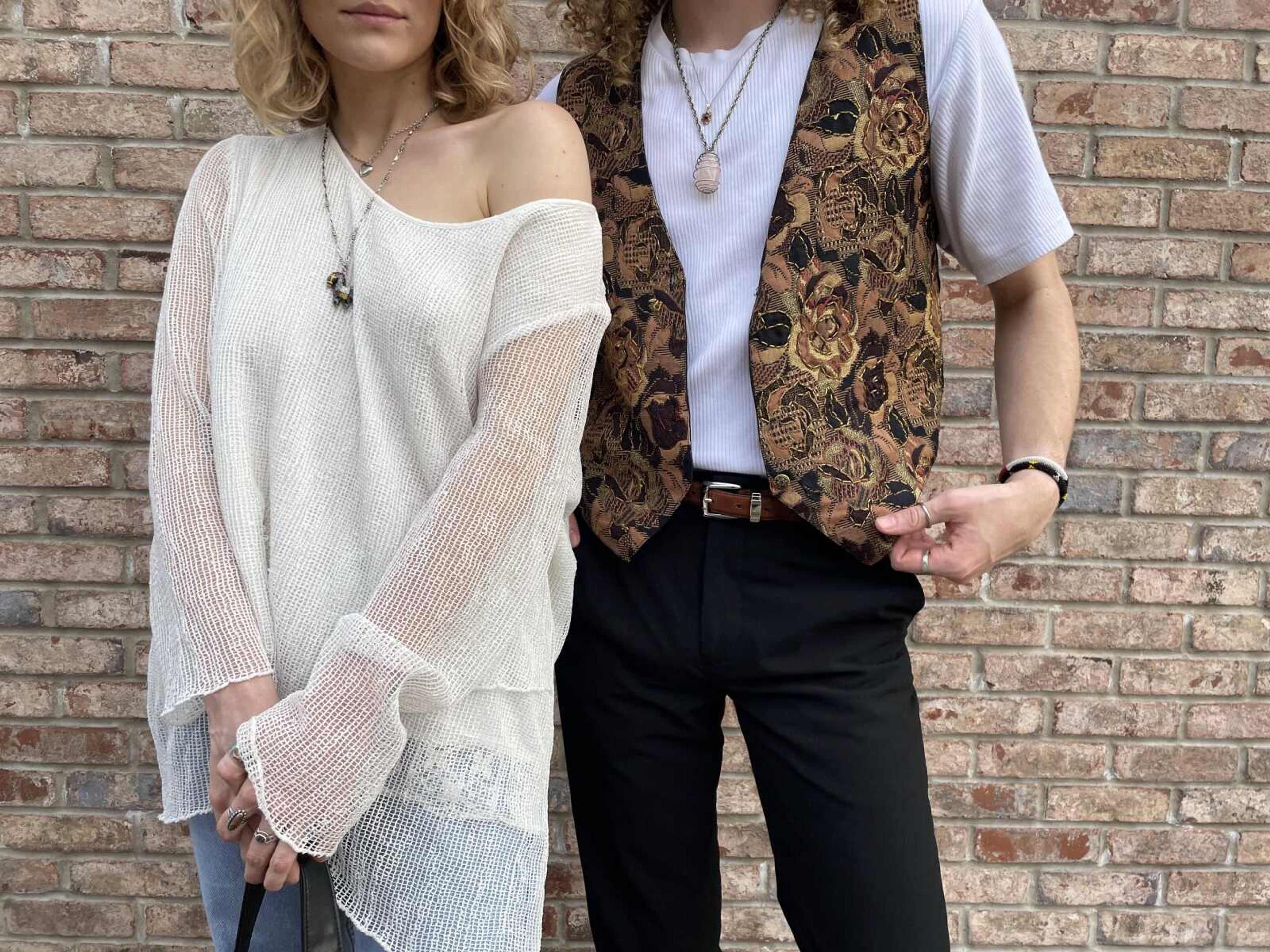 (RIGHT) Nicholson is wearing a vest he found from Annie Laurie’s 50% off Bargain Basement and (LEFT) Fritsche is showcasing a white blouse from Safe House of Southeast Missouri Thrift Store. Nicholson and Fritsche have been thrifting together since they were in high school because they like to share their unique taste in style.
