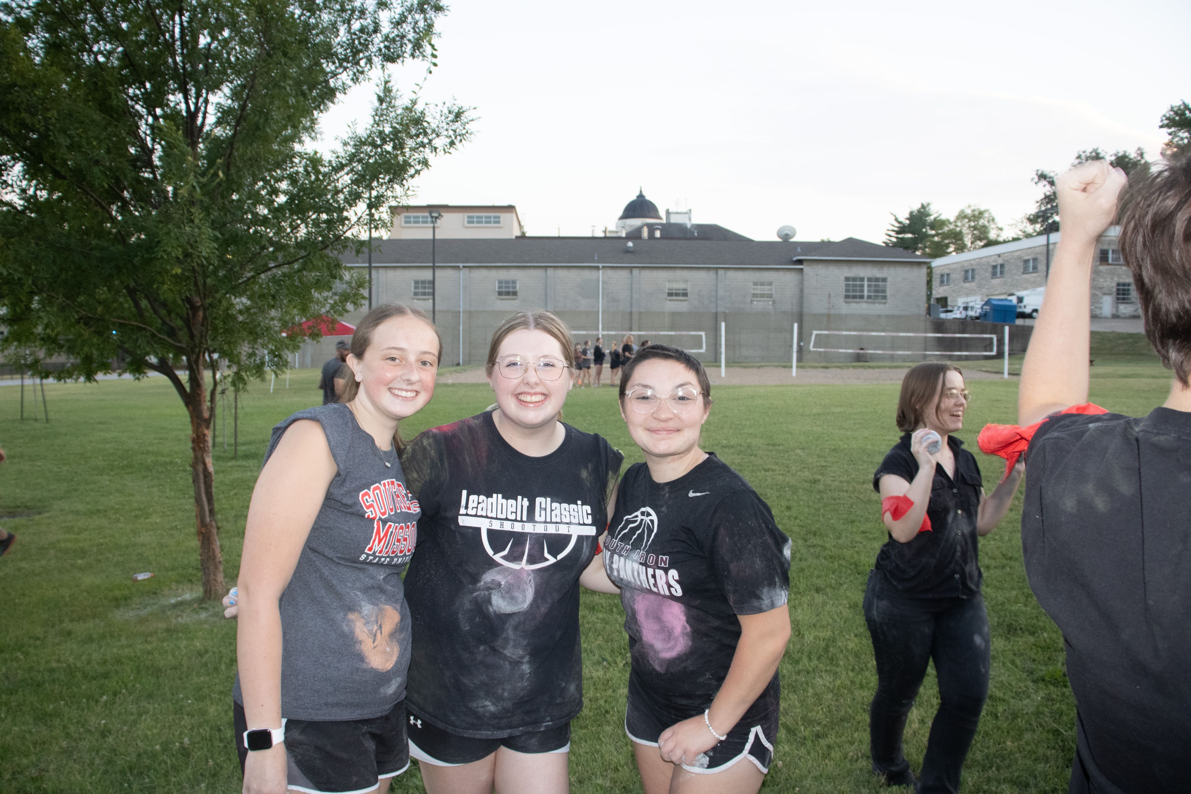 Students pose for a photo after playing dust tag on Parker Field.