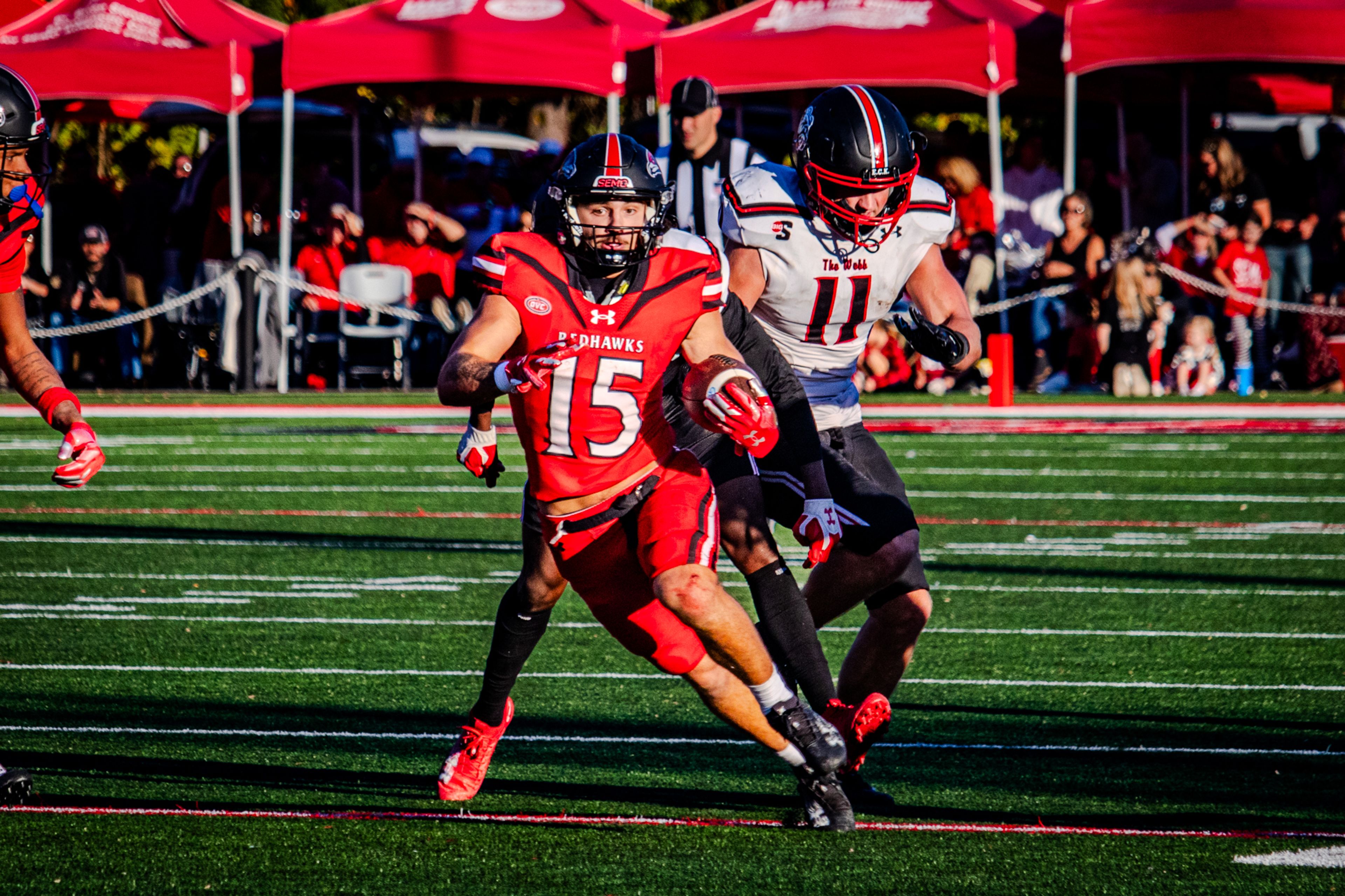 Sophomore running back Cole Ruble rushes the ball against Gardner Webb university on homecoming. Ruble finished the game with 122 rushing yards, and a touchdown. 