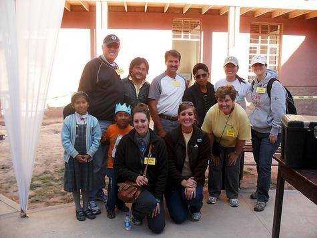 The eye clinic team, pictured here assisted Peruvians by giving them glasses, pictured here with two of the translators and two of the patients at the clinic. Submitted photo