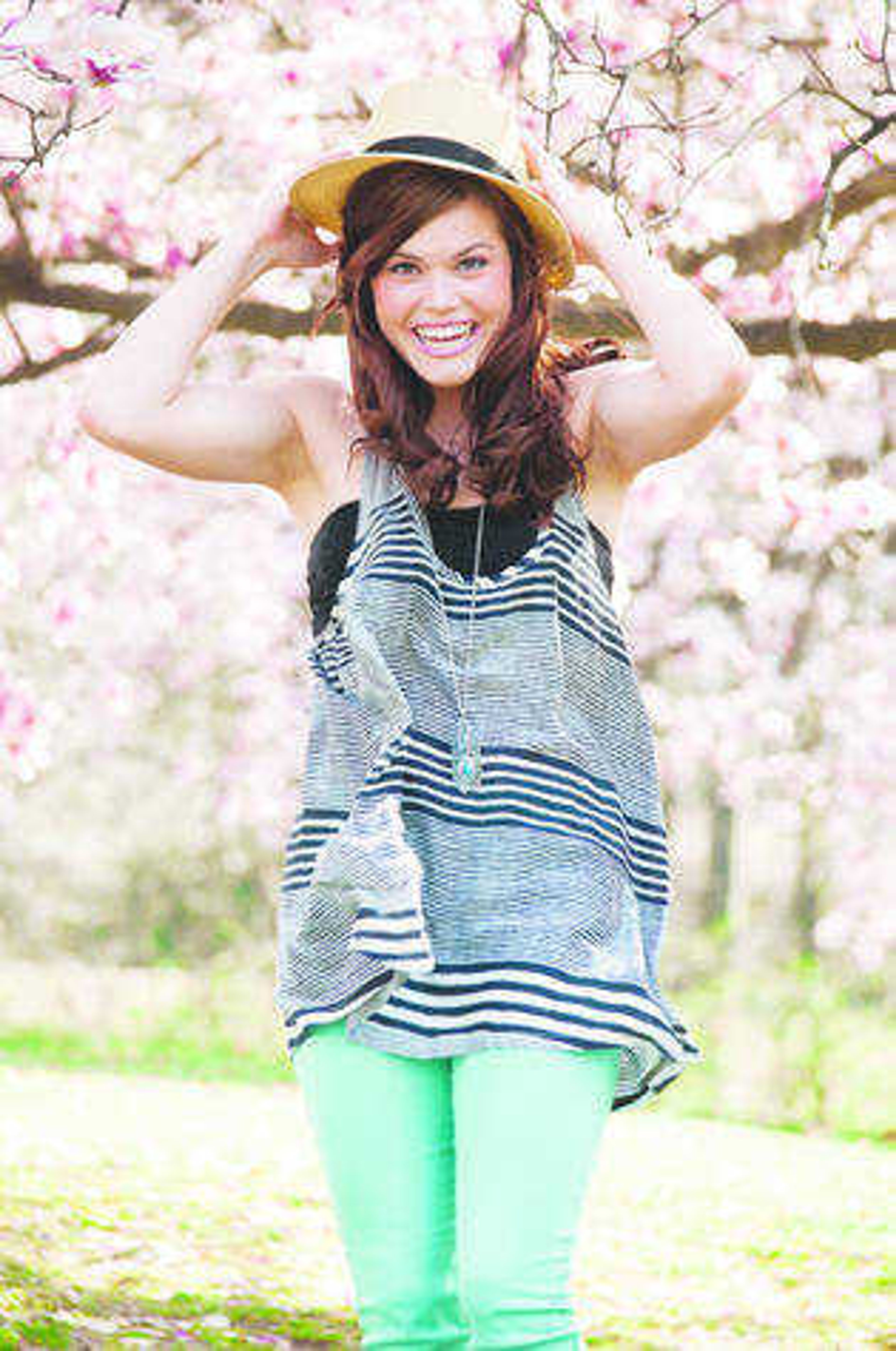 Straw hat, mint jeans and striped tank from Stash. Photo by Alyssa Brewer