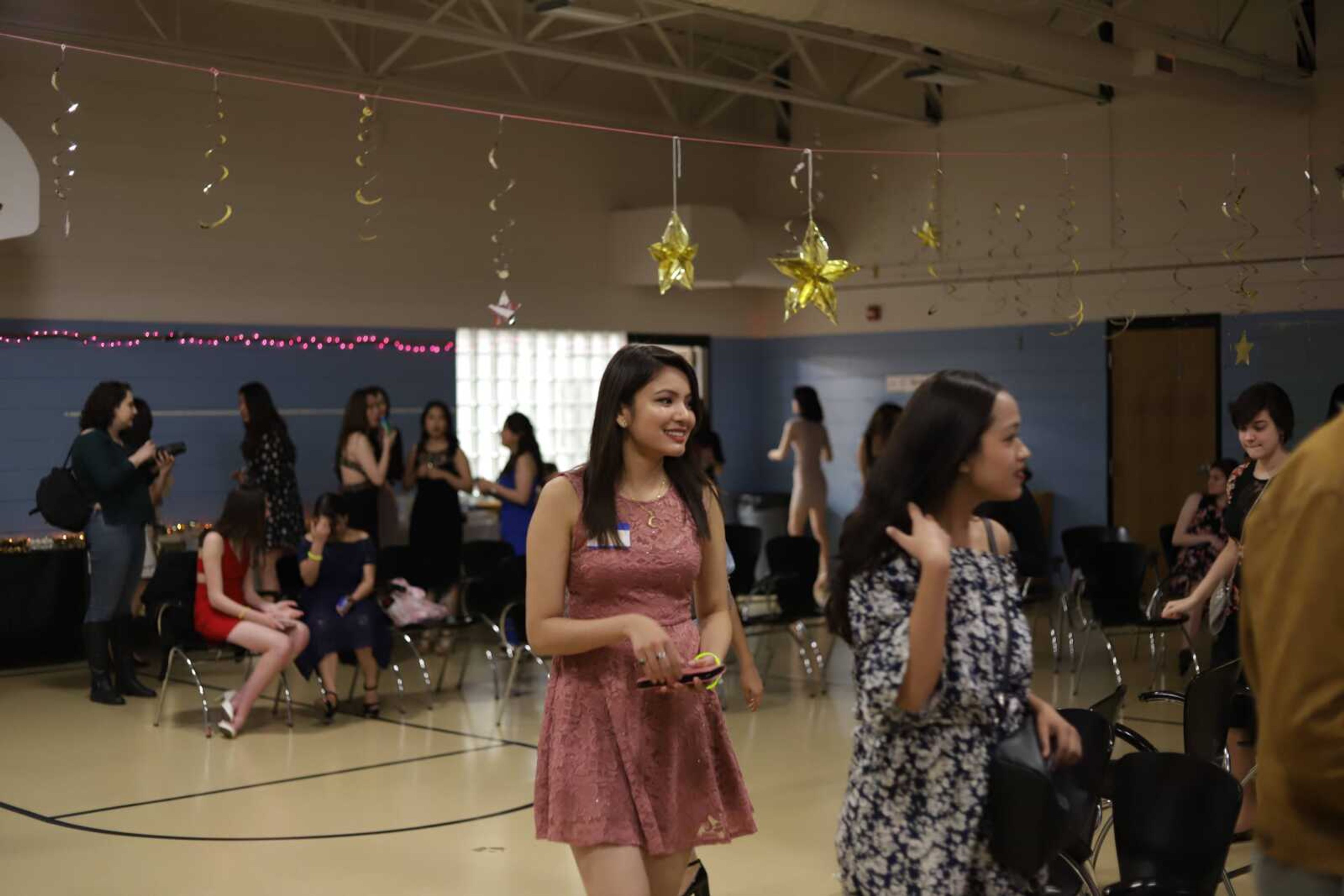 Students socializing at annual ISA Prom held in the International Village for the first time, March 22.