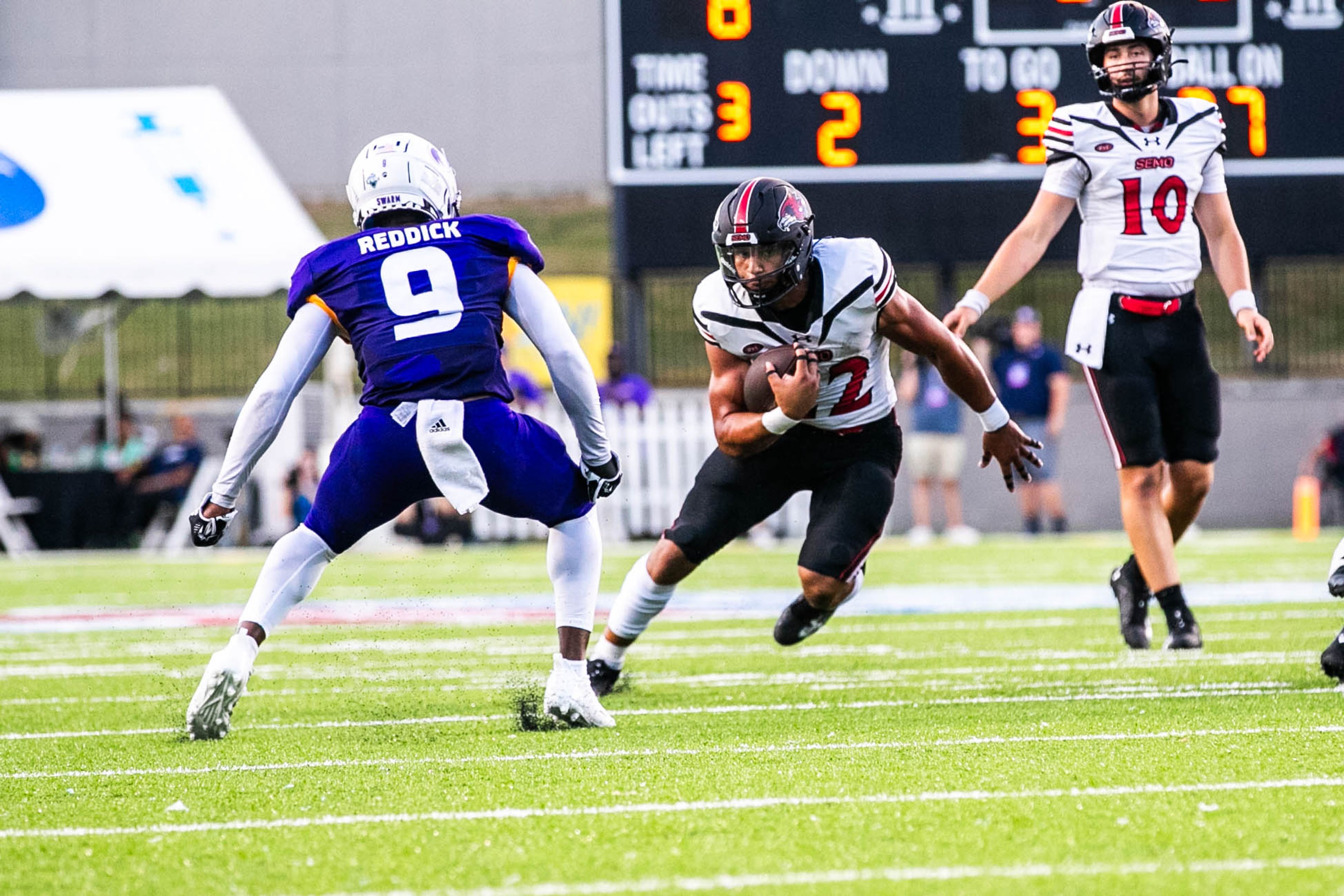 Freshman running back Payton Brown moves past a defender in the FCS Kickoff versus North Alabama. The Redhawks defeated the Lions 37-15.