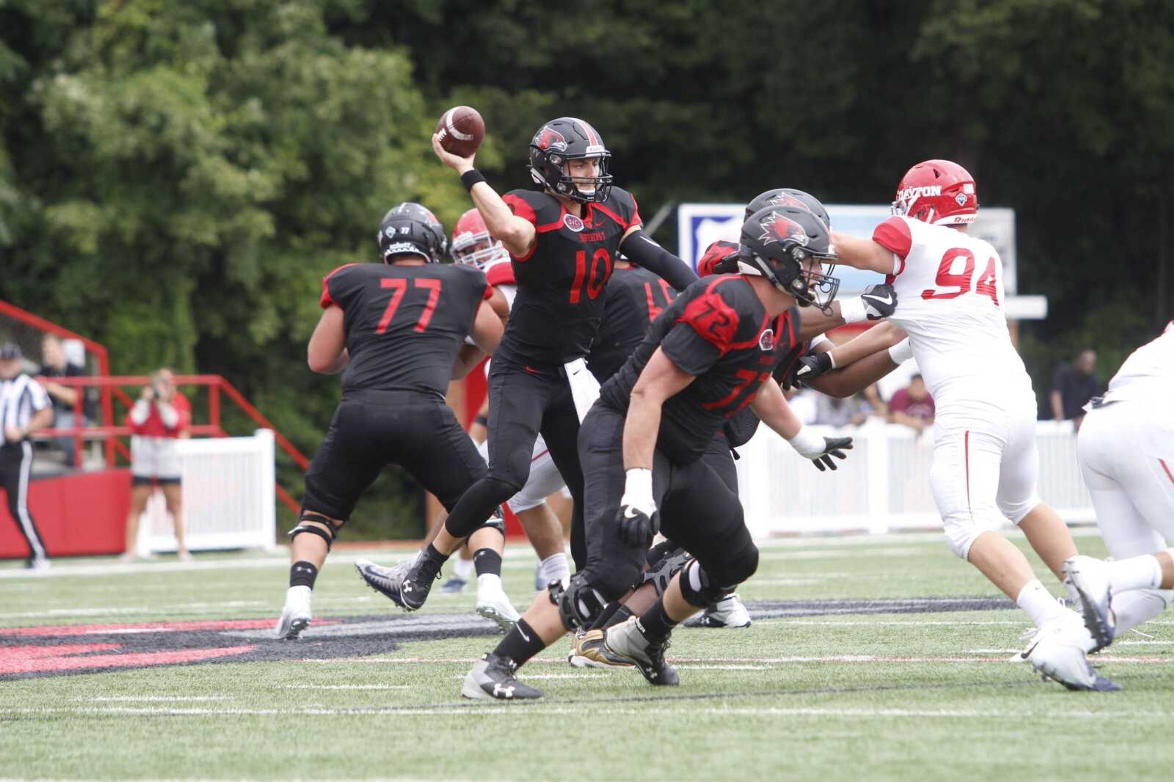 Daniel Santacaterina elevates to make a pass during a 40-21 win over Dayton on Sept. 8.