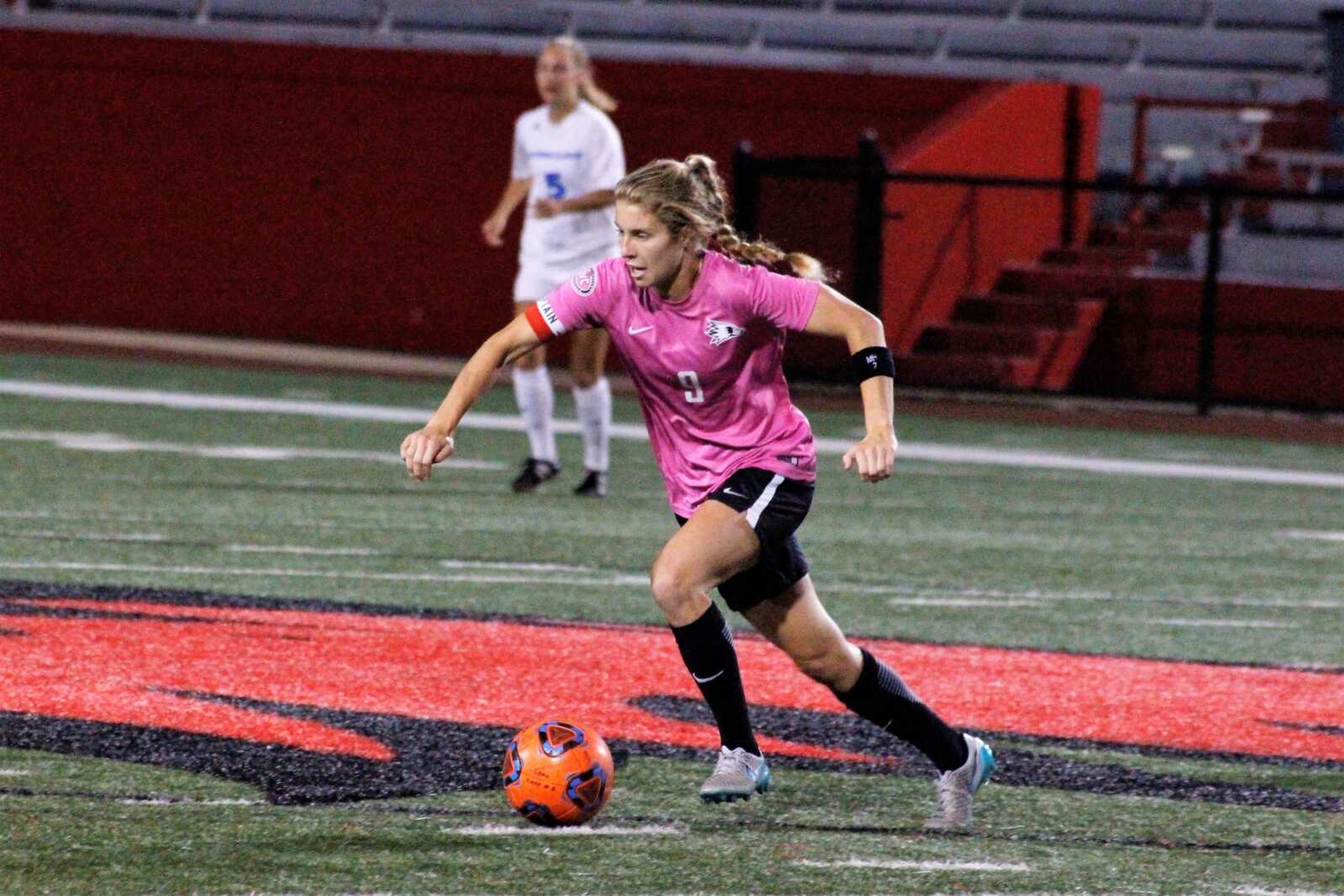 Senior, Maddy Cornell brings the ball into play on Oct.11 against Eastern Illinois.