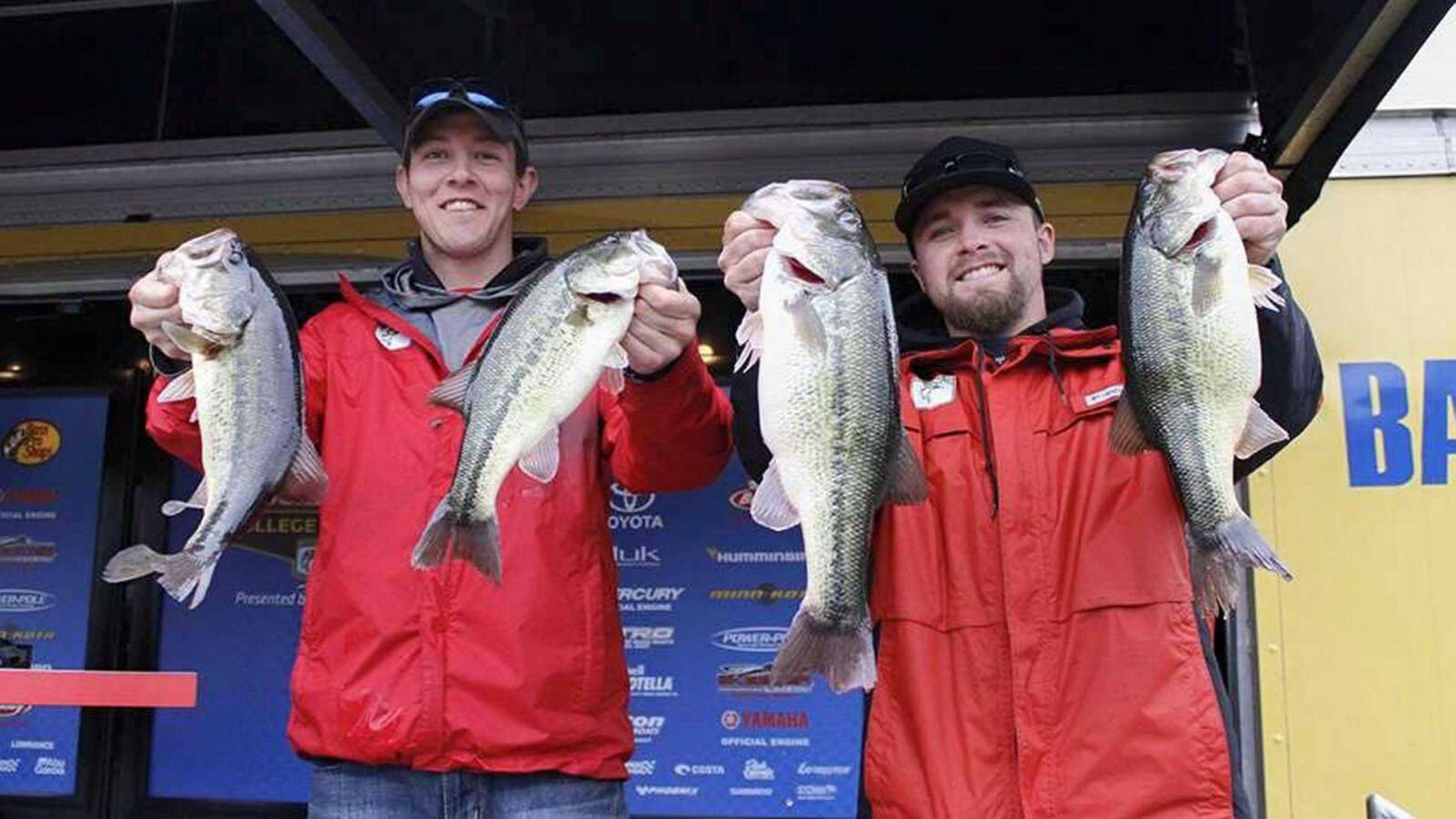 Left to Right: John Soloman and Nick Moore hold up fish while competing this season.