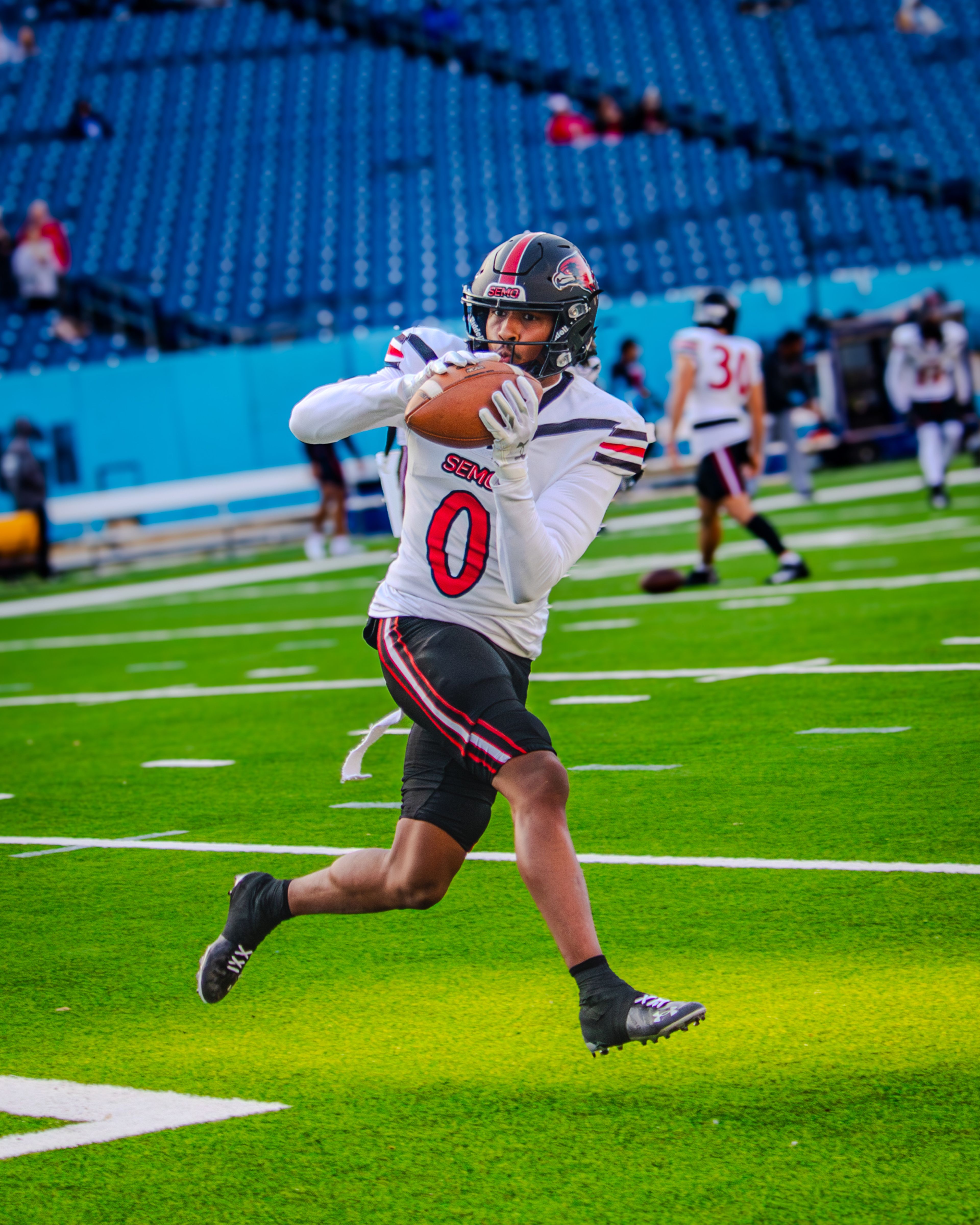 Sophomore wide receiver Cam Pedro warms up before the game against TSU. 