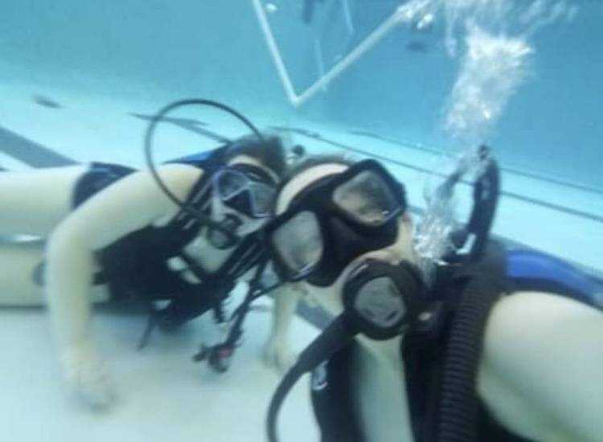 Amanda Milbrandt and Tori Wright enjoying scuba diving at the Student Aquatic Center.