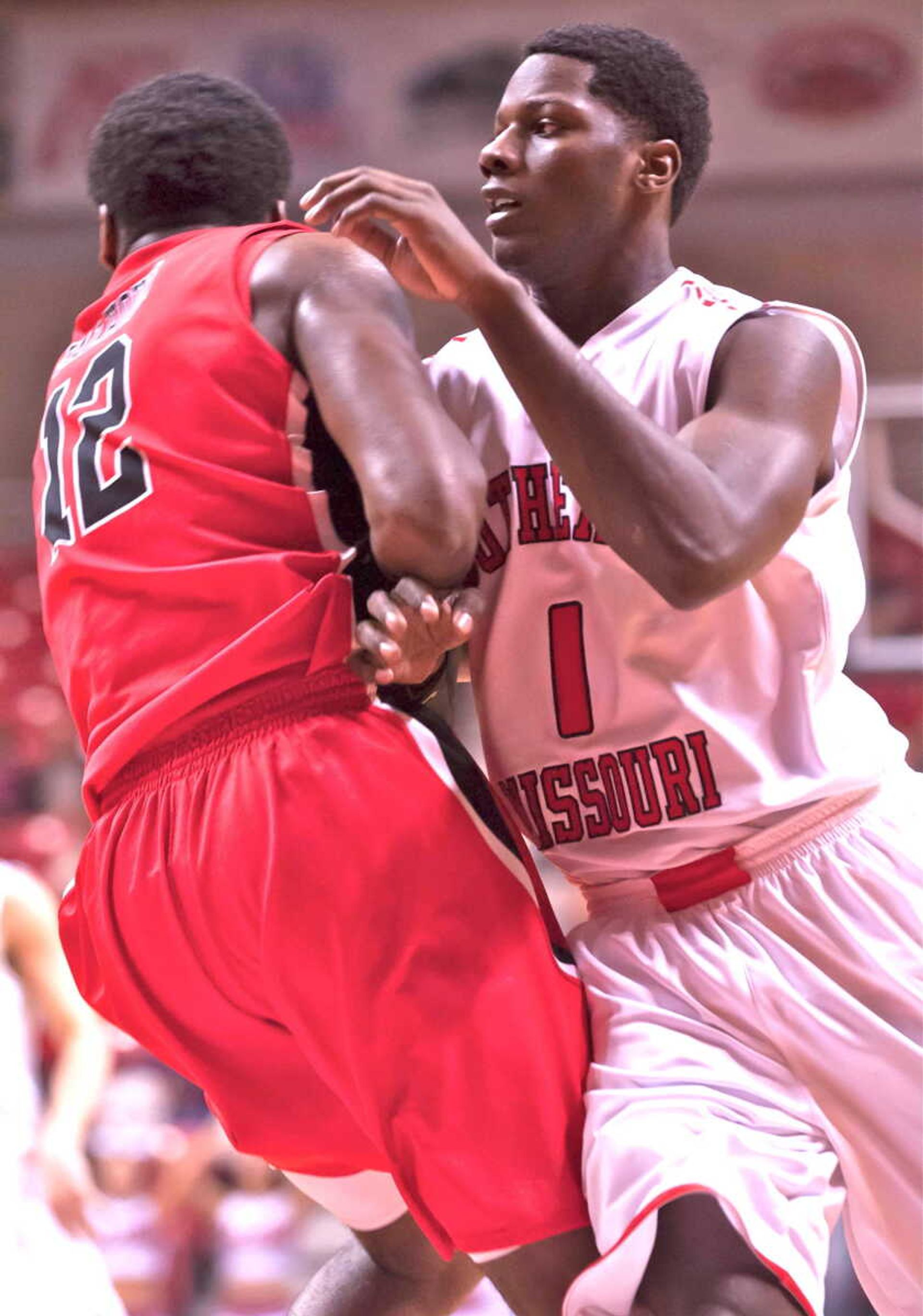 Southeast forward Nino Johnson tries to get past a Ball State player during a game Saturday at the Show Me Center. Photo by Alyssa Brewer
