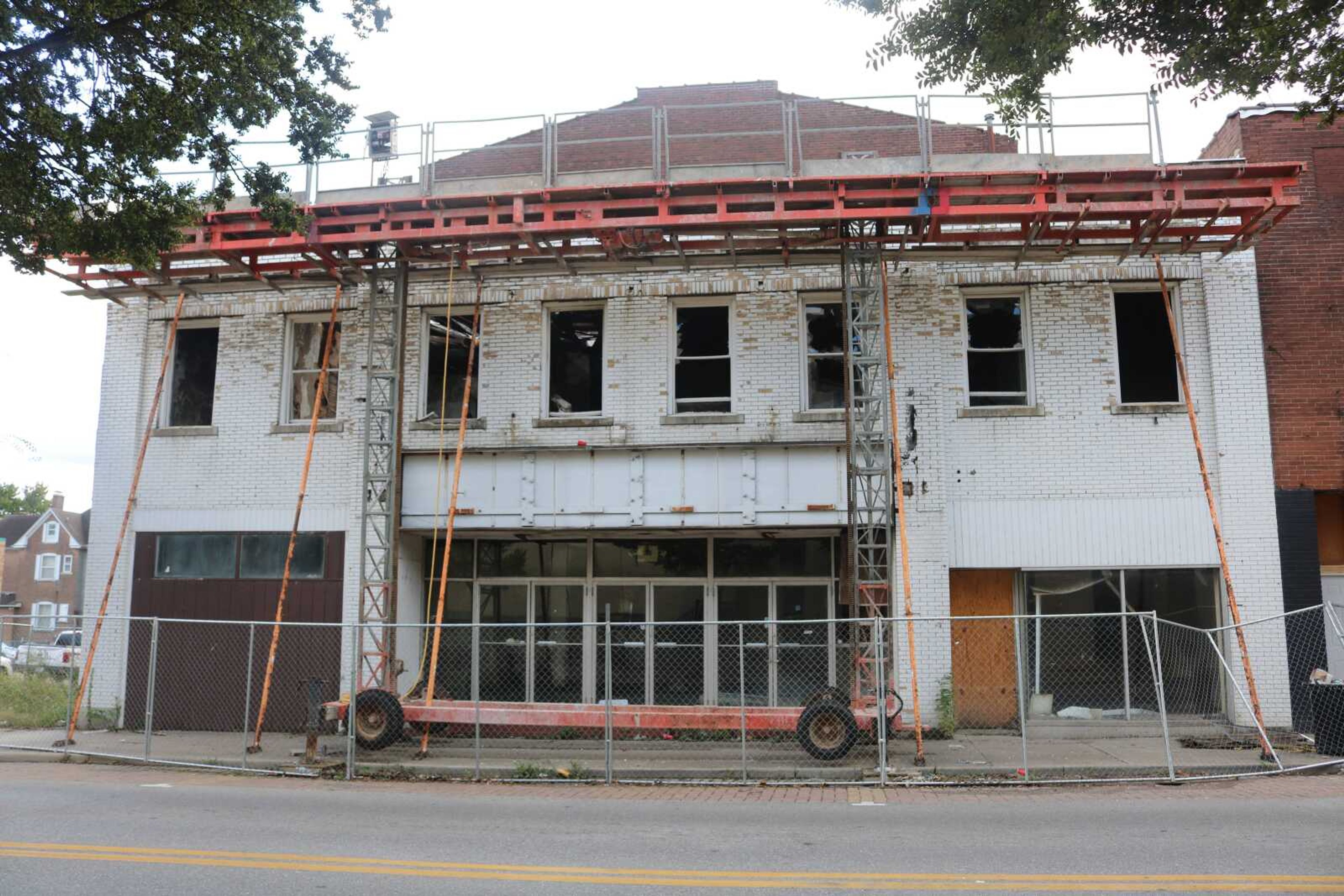 The historic Broadway Theatre in downtown Cape Girardeau, built in 1921, awaits refurbishing as scaffolding temporarily secures the front of the recently burned building.