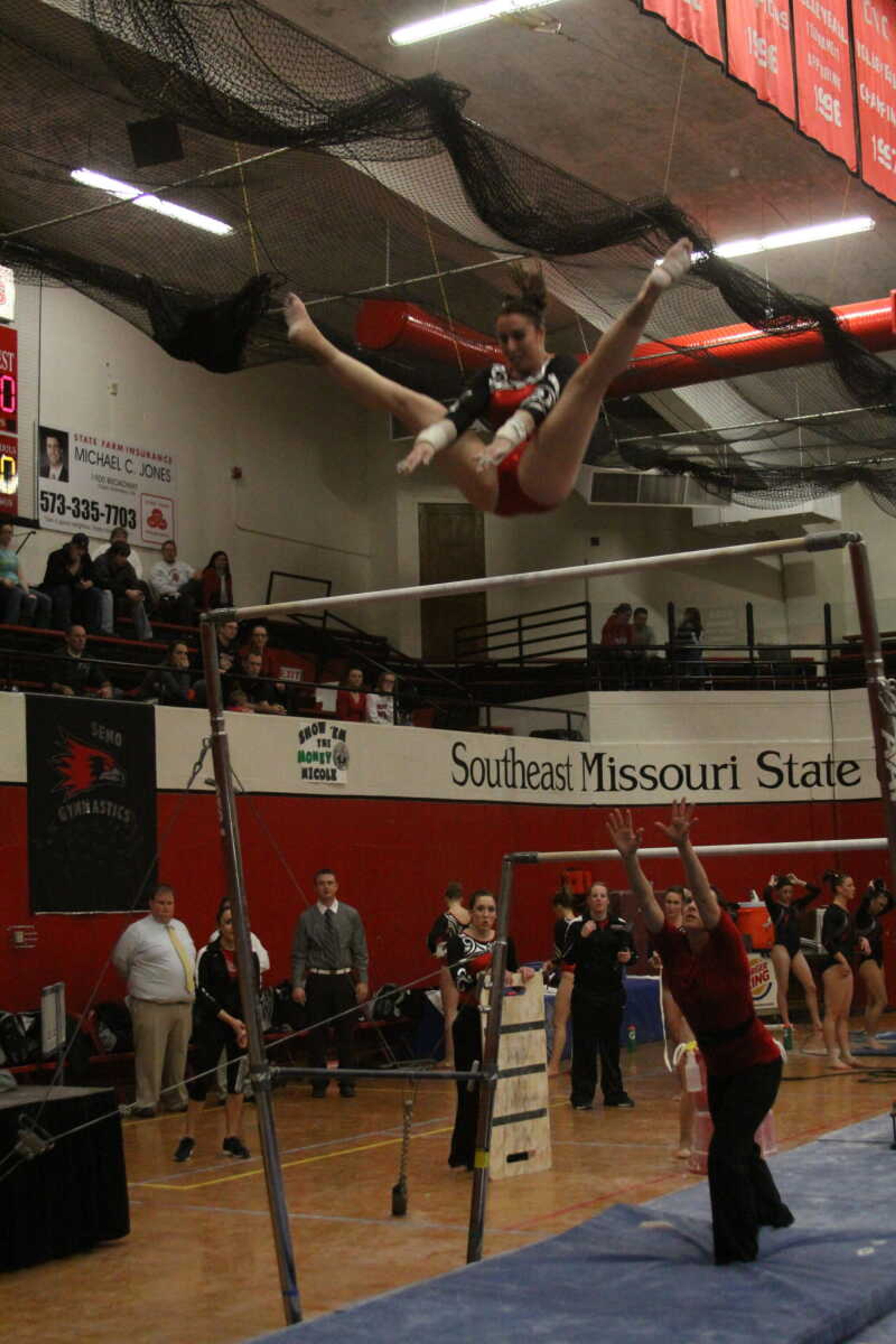 Junior Margaret O'Neal scored 8.850 on the uneven bars during Friday's meet against Northern Illinois at Houck Field House. - Photo by Kelso Hope