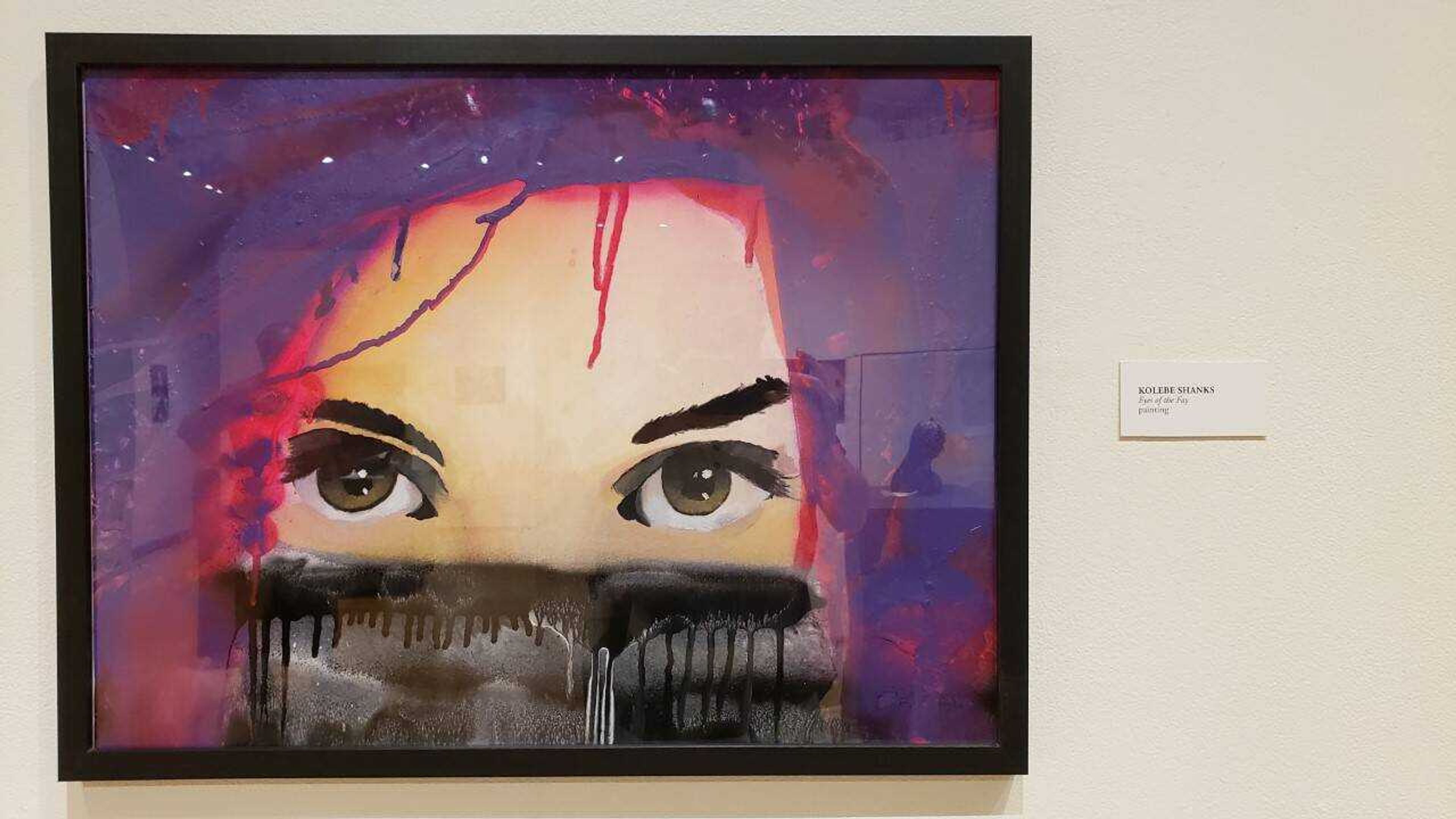 “The Eyes of the Fay” is a portrait created by Kolbe Shanks. Shanks said this piece shows beauty, detritus, sadness and vulnerability. The piece is on display at the Crisp Museum until May 10.