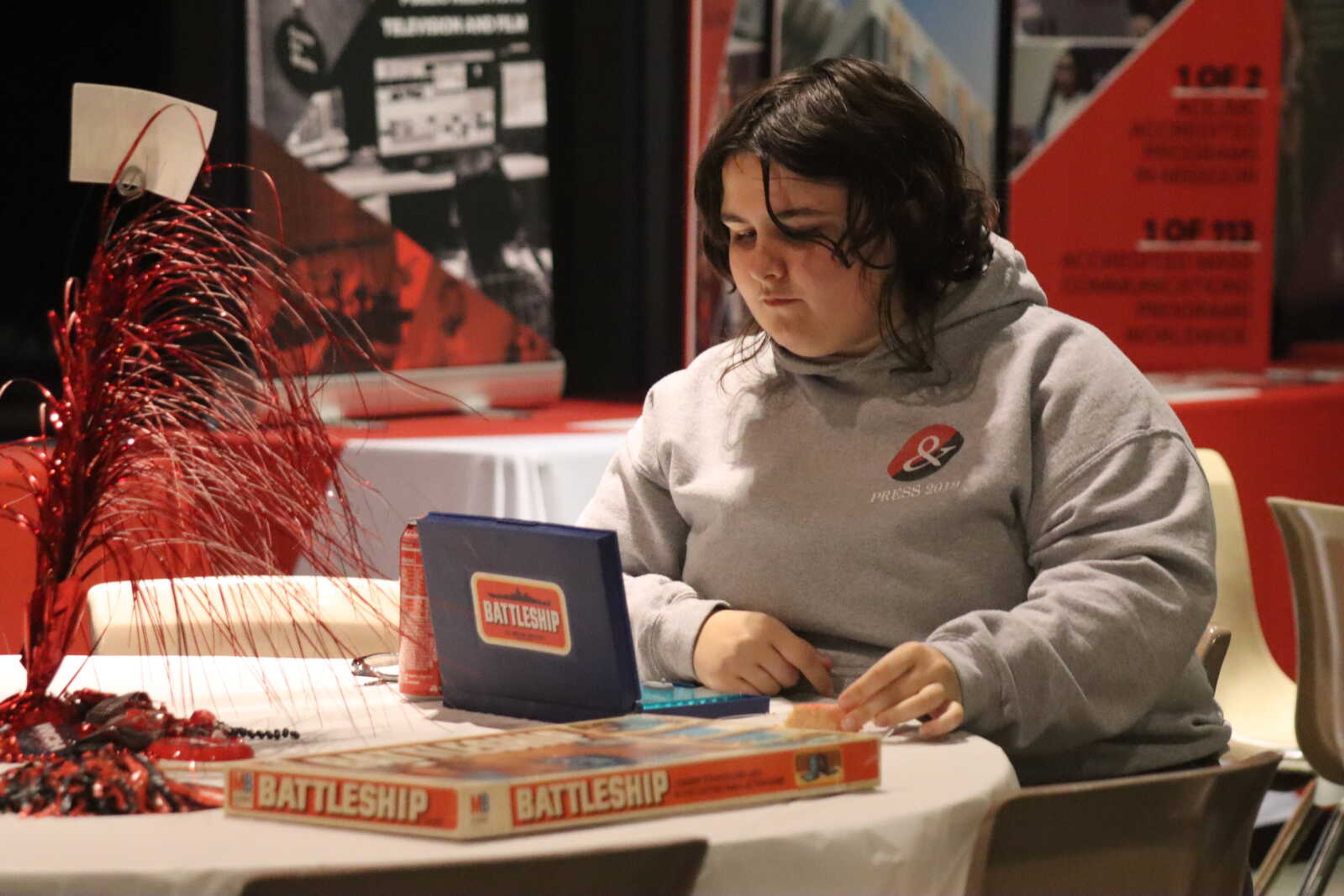 A SEMO student plays Battleship against a friend at the Night at the Museum event held by Crisp Museum. Many other games were also offered, as well as an escape room, painting opportunities and a food table. 