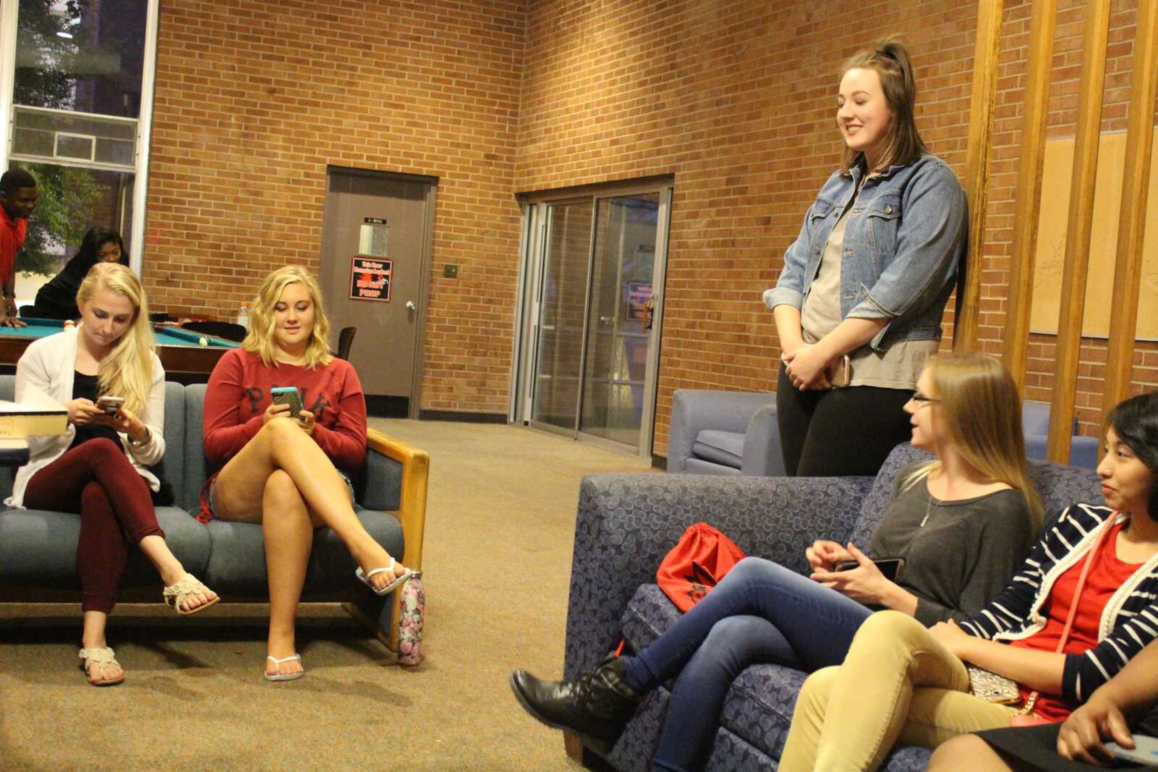 Beauty club vice president Lela Roach speaks to new members of the club at the first meeting on on Aug. 7 held in the lobby of Dearmont Hall.