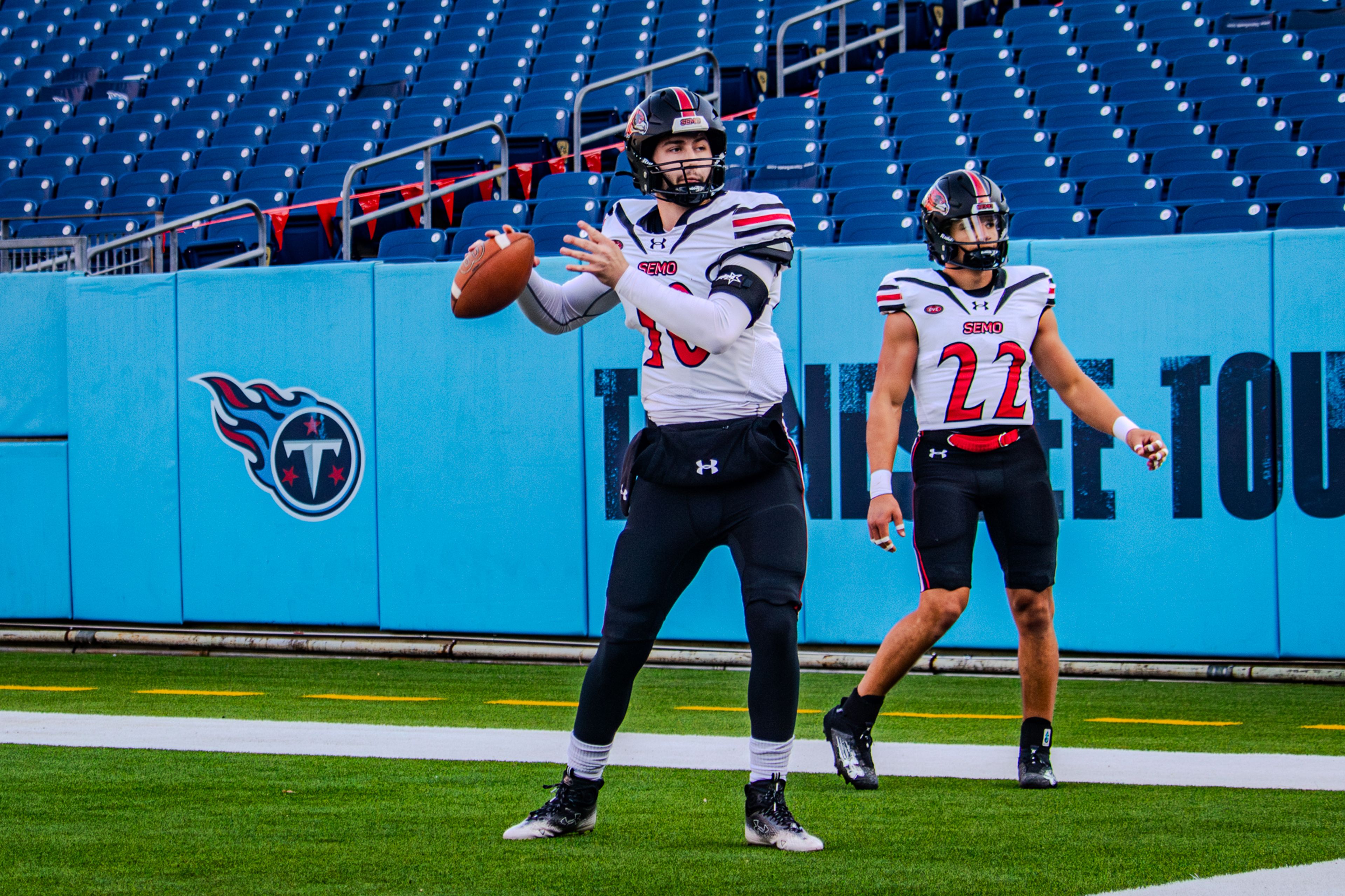 Senior quarterback Paxton DeLaurent warms up before the game against TSU. 