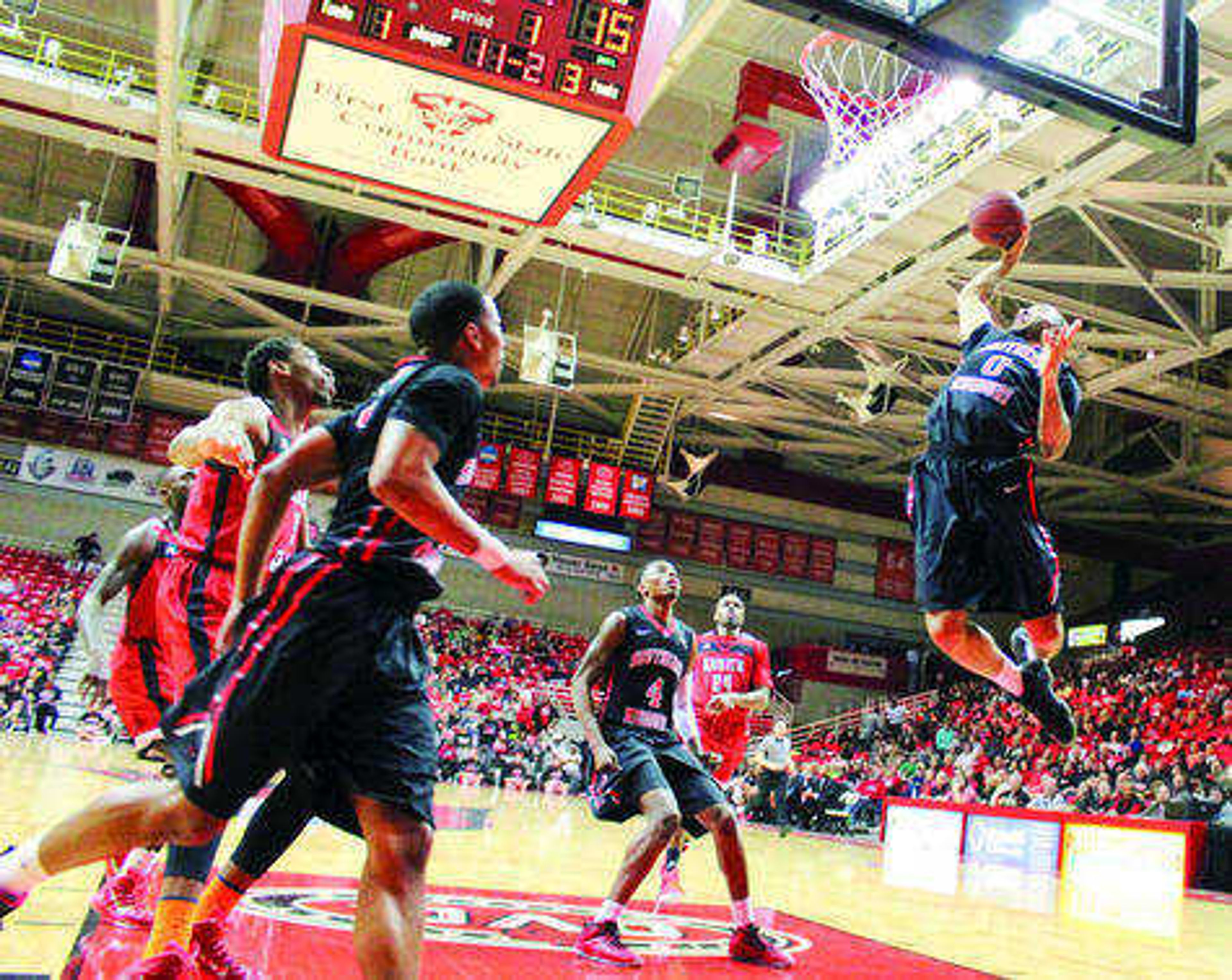 Senior Josh Langford throwing in a one-handed slam against Austin Peay on Senior Night on Feb. 28 in Southeast Missouri State's final home game of the season at Houck Field House. Photo by Doc Fiandaca