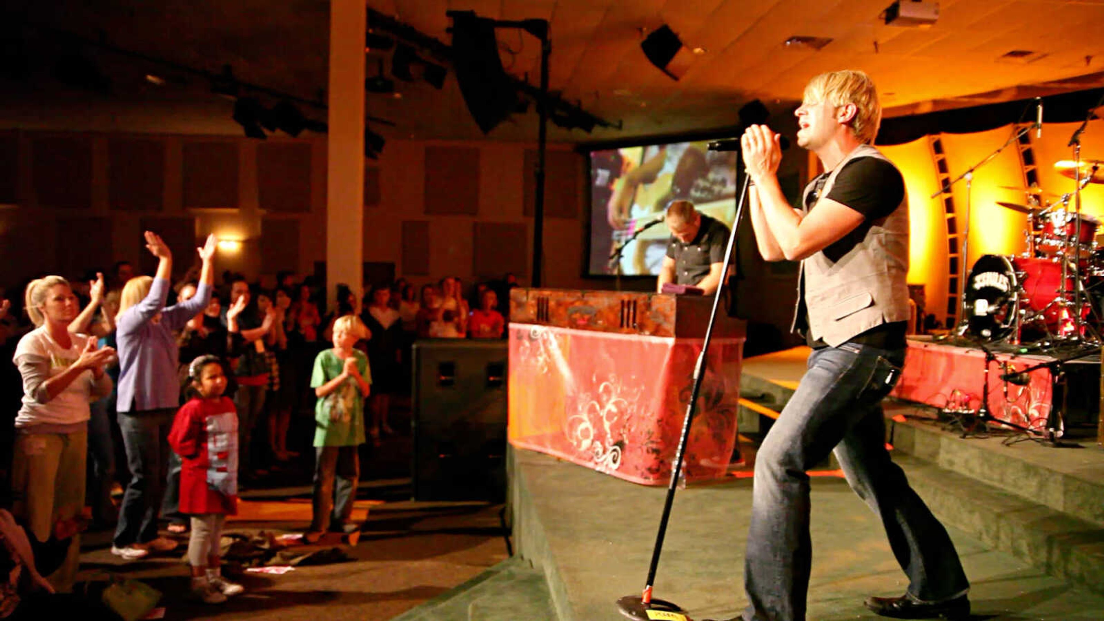 Jason Barton, lead singer of 33 Miles, performs onstage at a concert at Cape First Church last year. Submitted photo