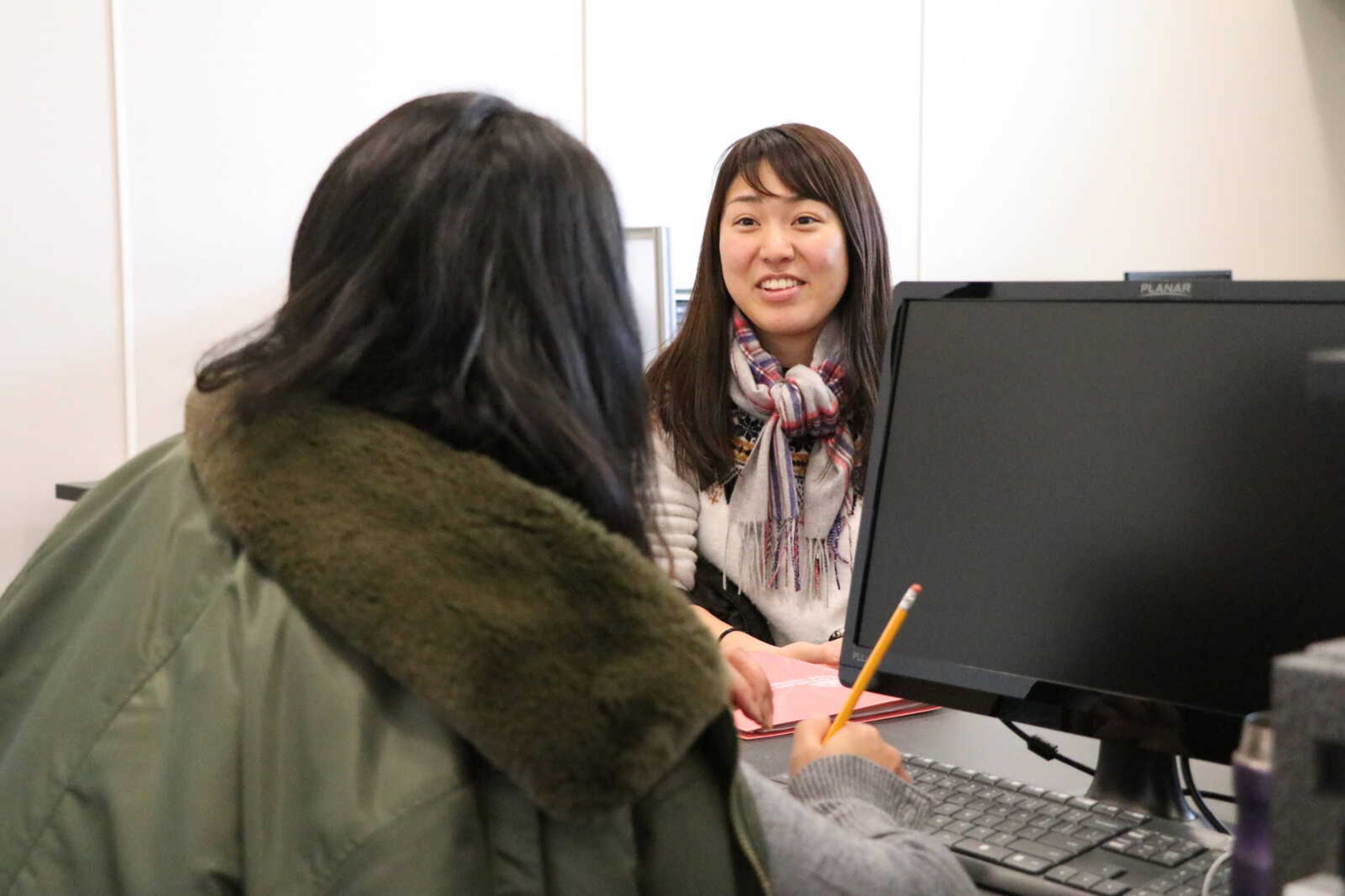 Utana Honnami attends the Tutoring Services lab in the International Village.