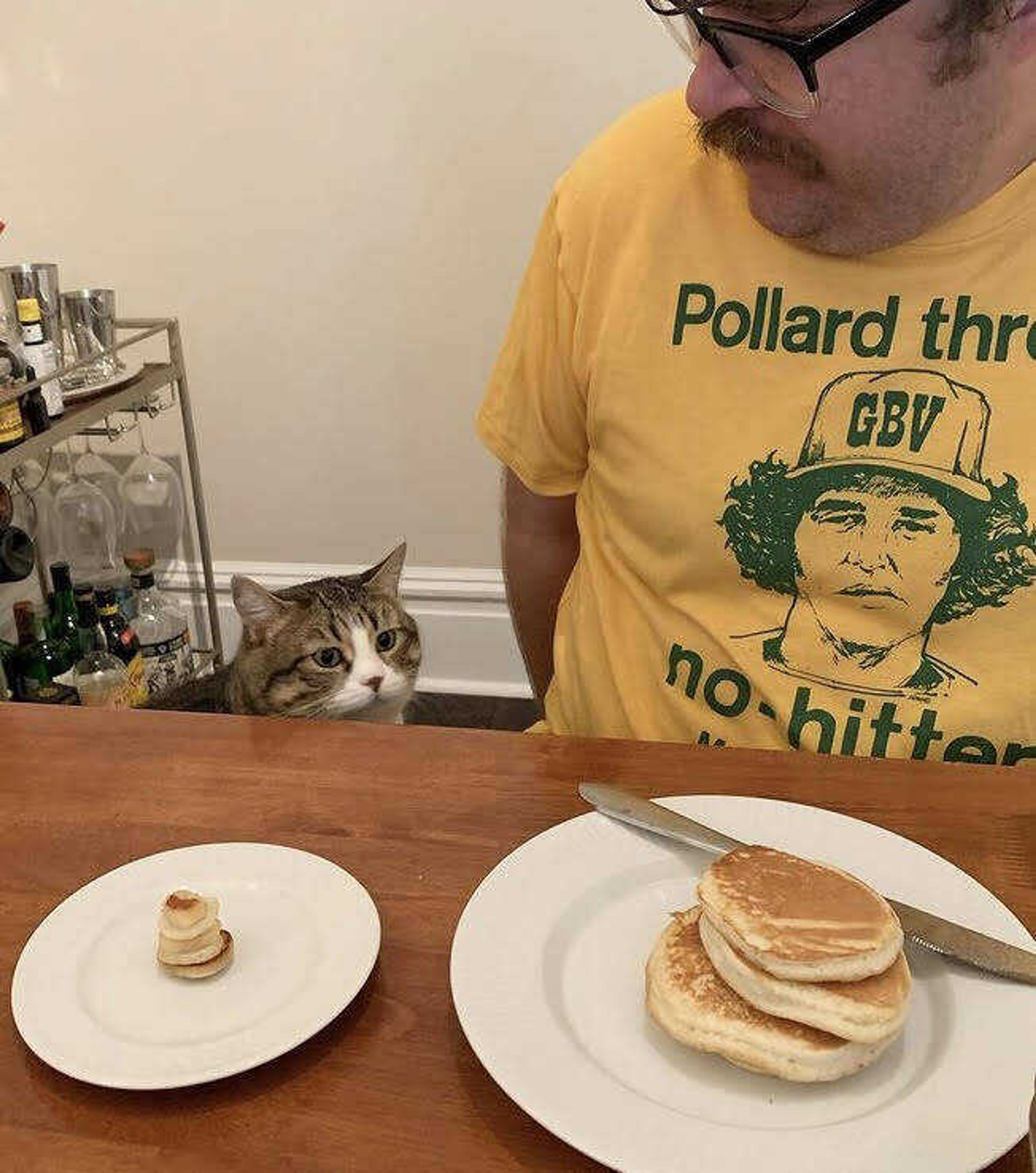 Associate professor James Brubaker poses with cat Poptart in a photo for their Instagram account, @poptart.thecat. The “chonky” cat’s Instagram bio reads, “Poptart’s my name. Snacks are my game.” 