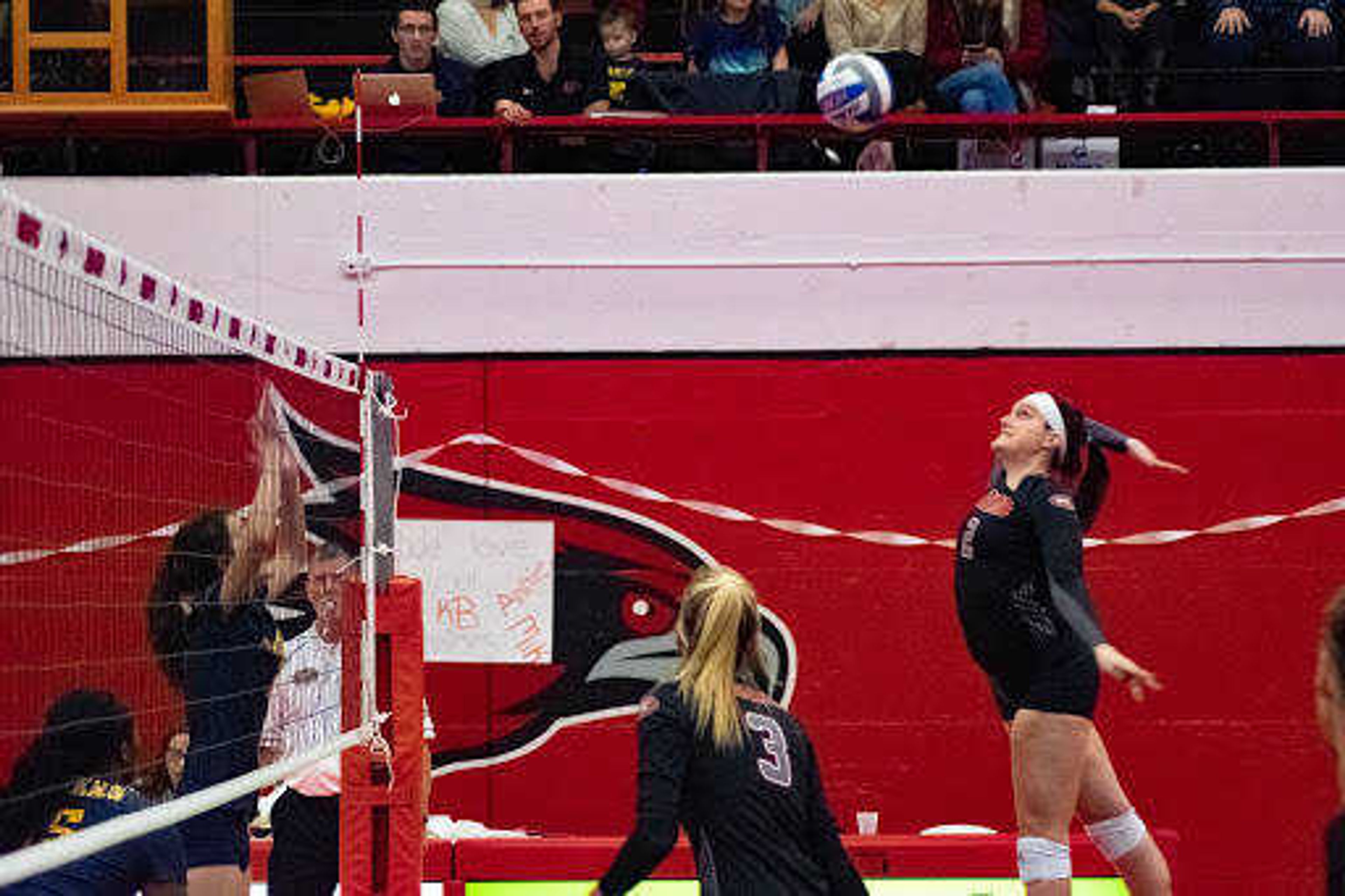 Annie Wehrheim (right) rises up for a spike against Murray State on Nov. 8 at Houck Field House.