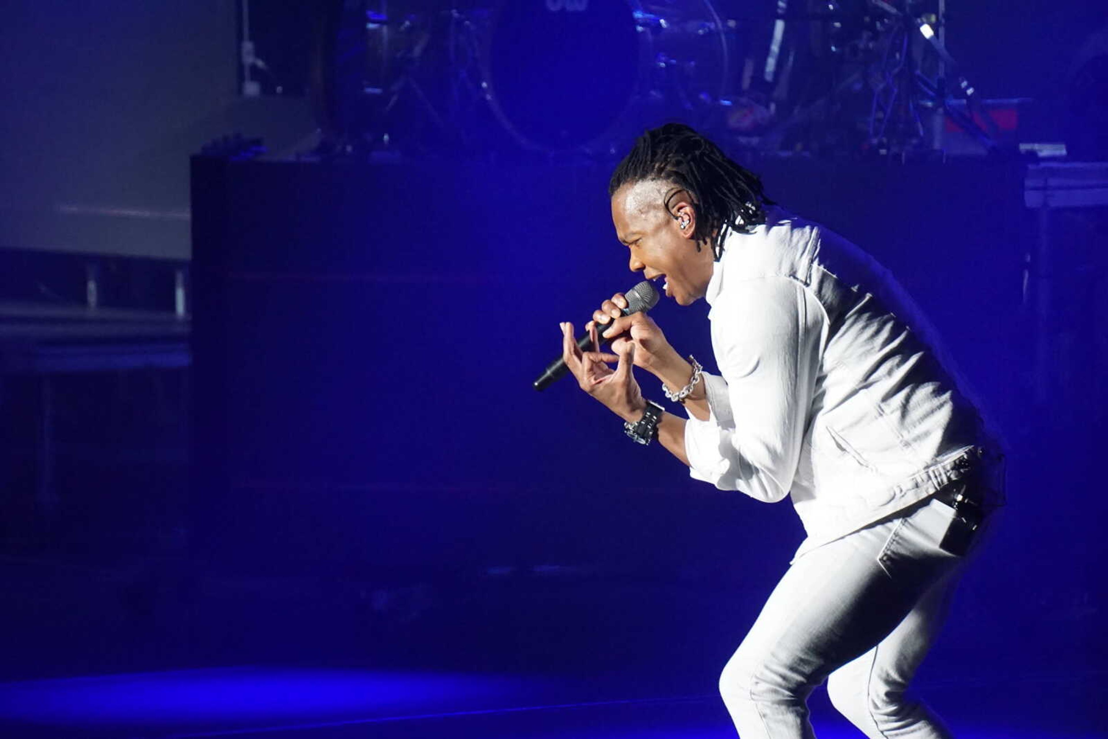 Michael Tait from the Newsboys sings to the crowd at the Show Me Center.