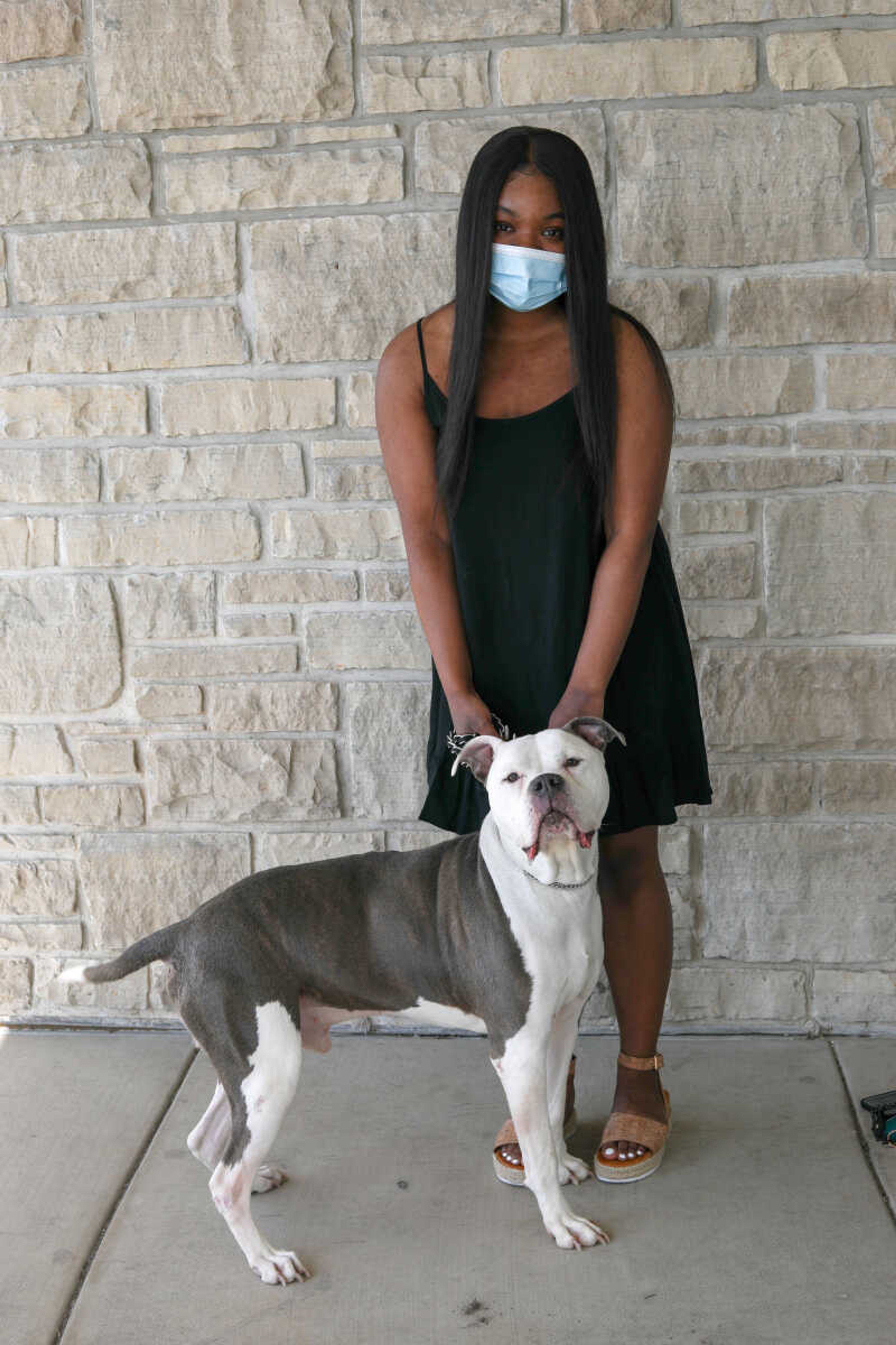 Sophomore De’Anna Vann poses with her emotional support pitbull, Blu.
