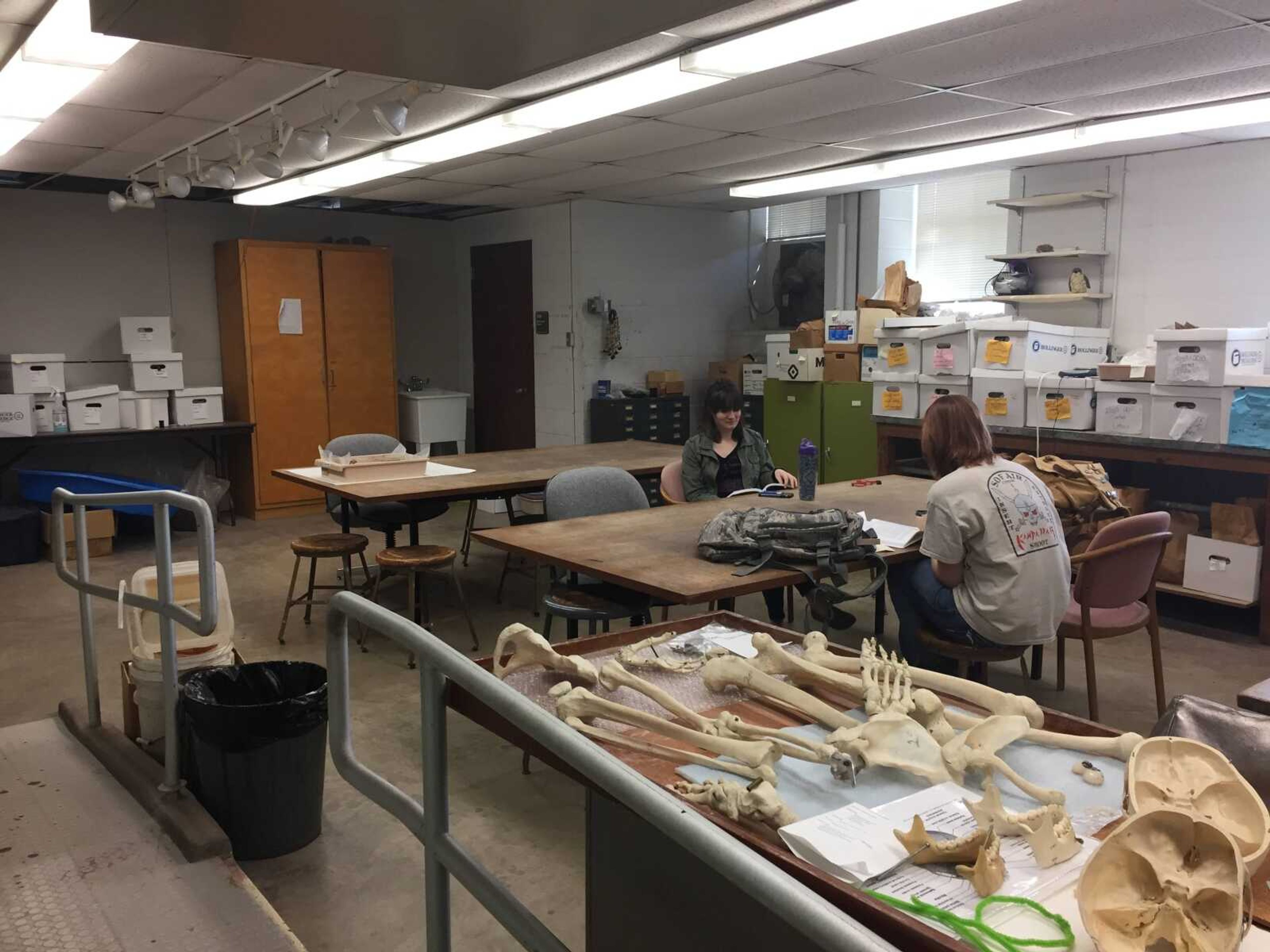 The archaeology lab has a temporary wall in the back of the photo restricting access to the effected parts of the building.