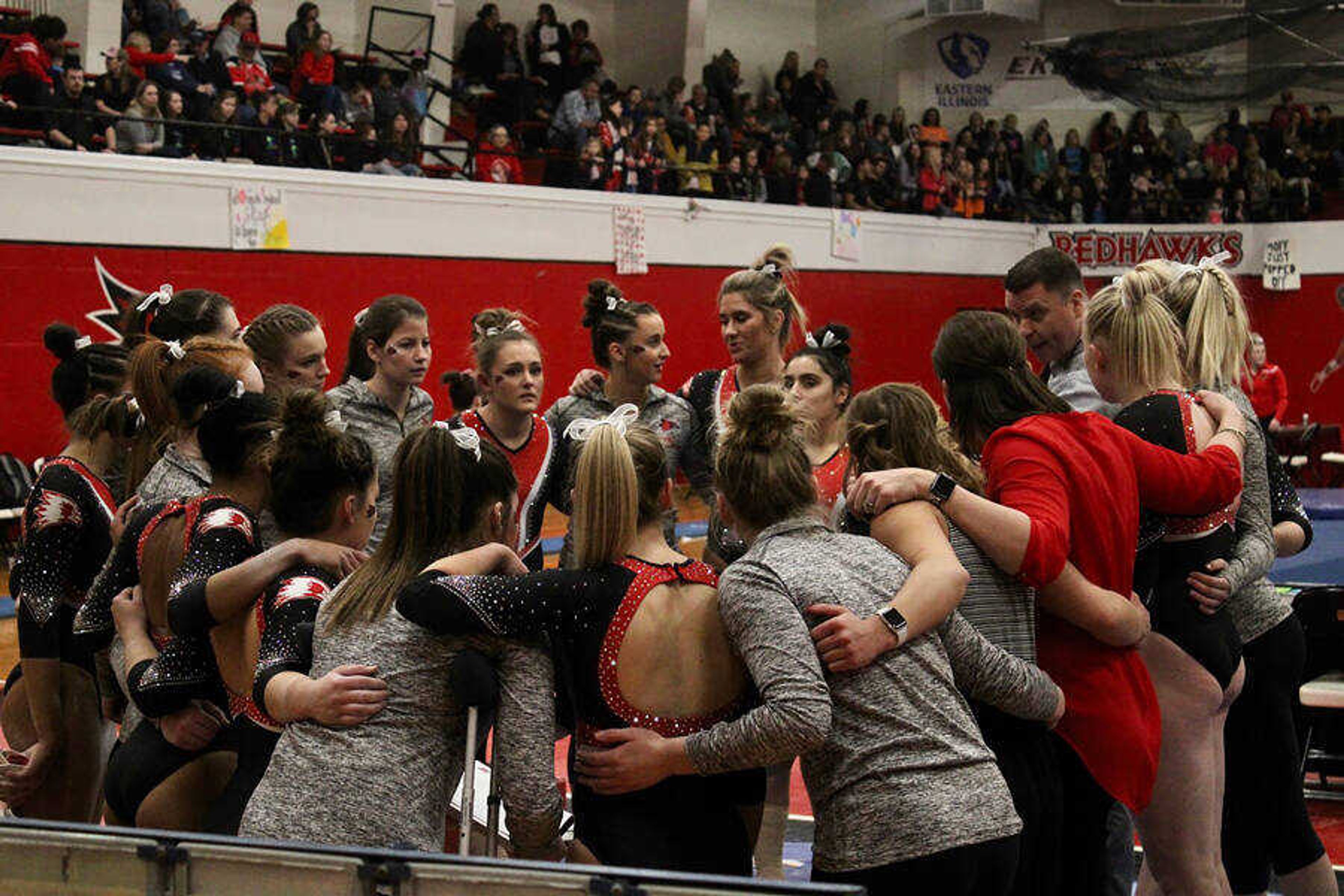 The Redhawks gymnastics team huddles before a match on Jan. 31, 2020 against Illinois State. Heidi Vanderboom joins Southeast following their 10-7 campaign.